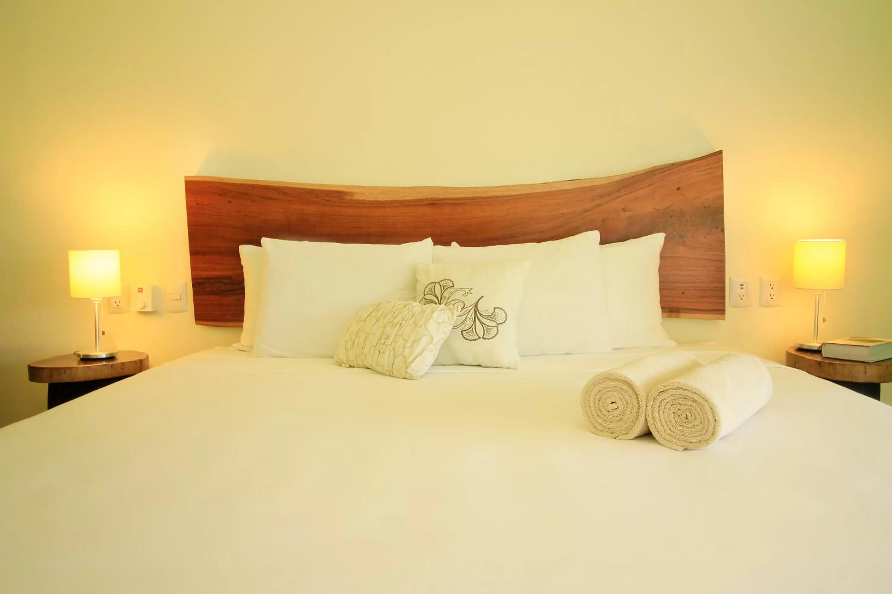 Bed in La Palmita Budget Boutique Hotel
