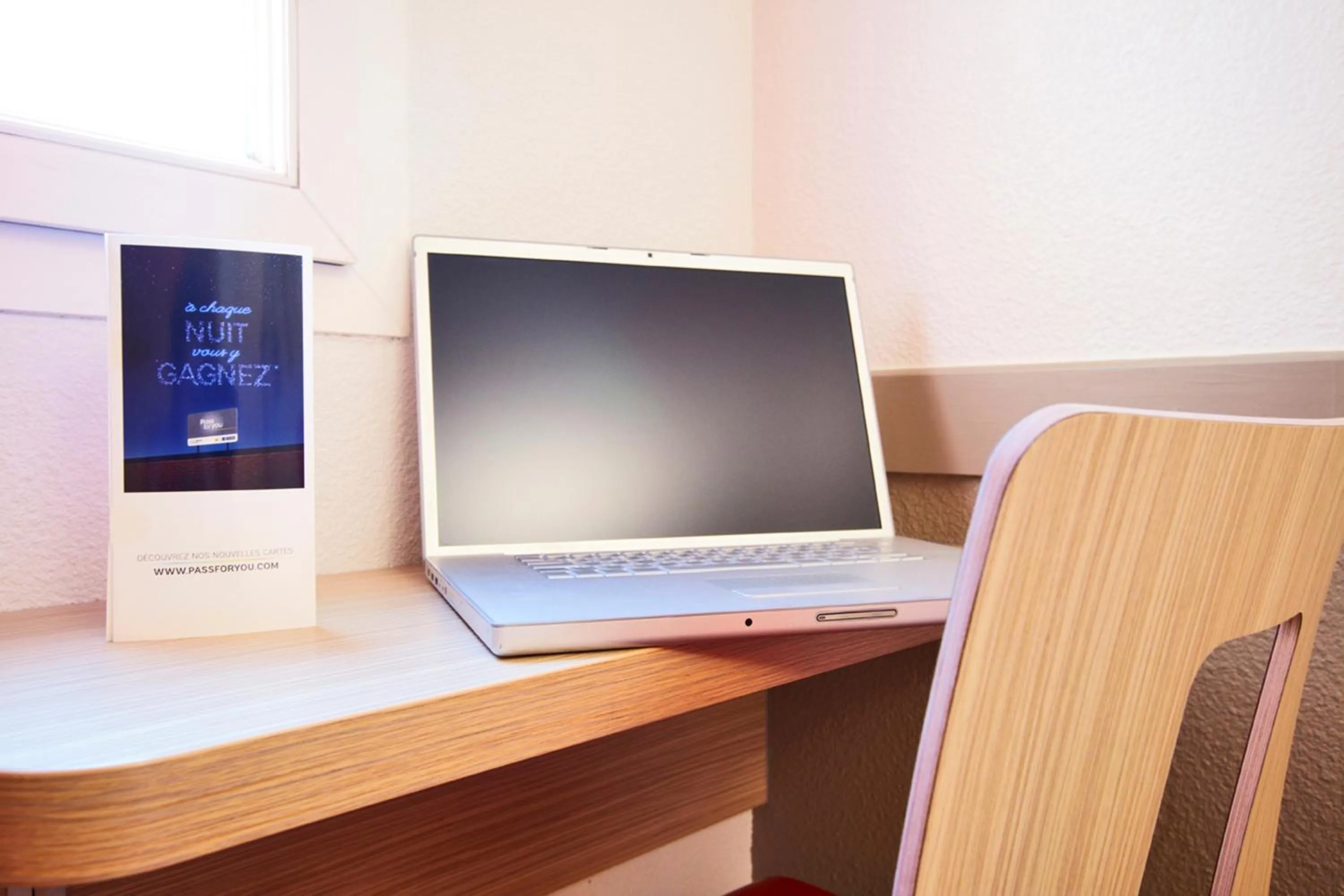 Bedroom in Première Classe Paris Ouest - Pont de Suresnes