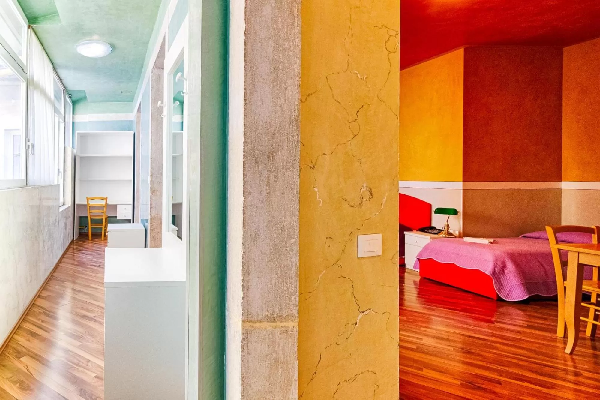 Seating area, Bed in Lloyd Residence Triestino