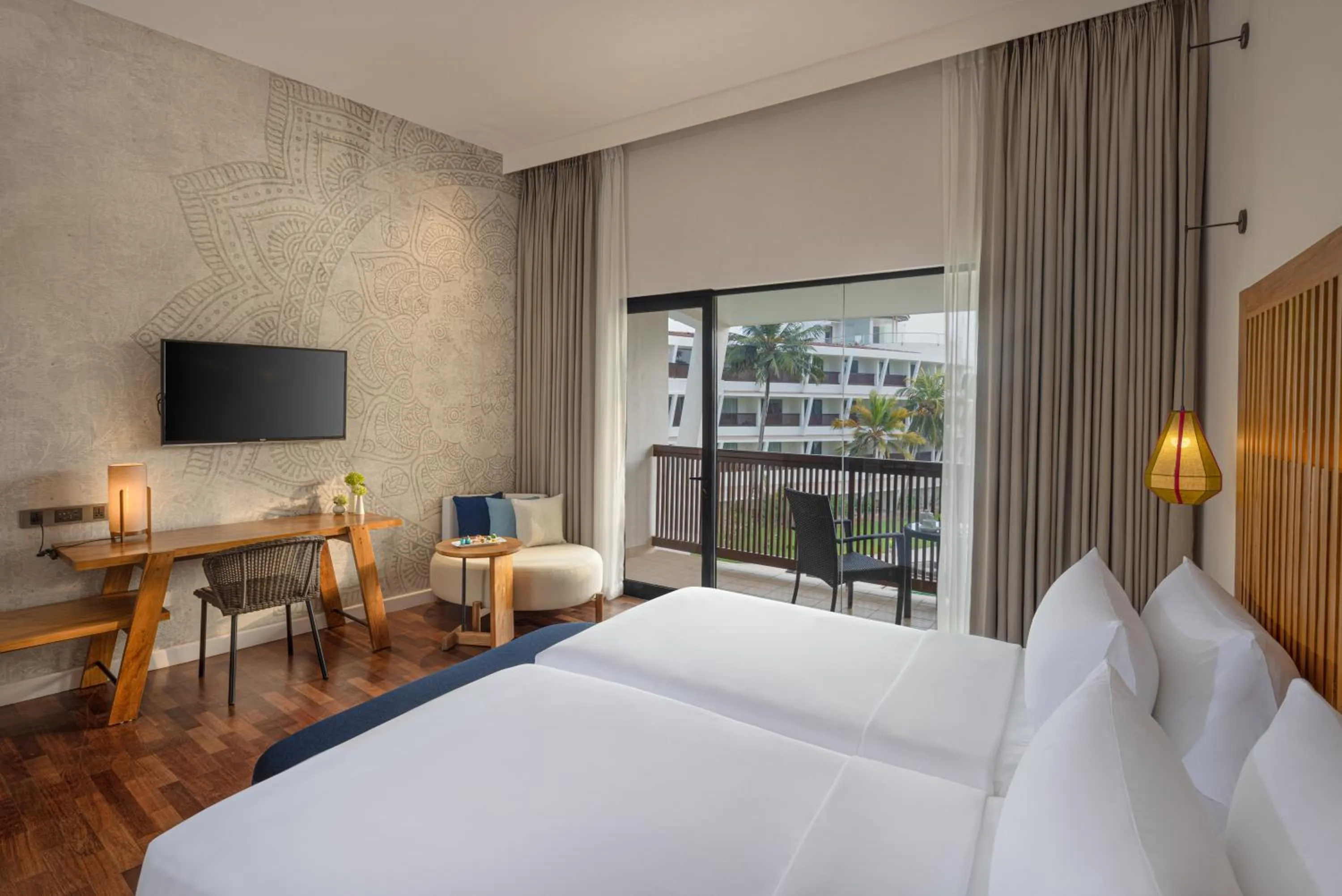 Pool view, Bed in Occidental Eden Beruwala