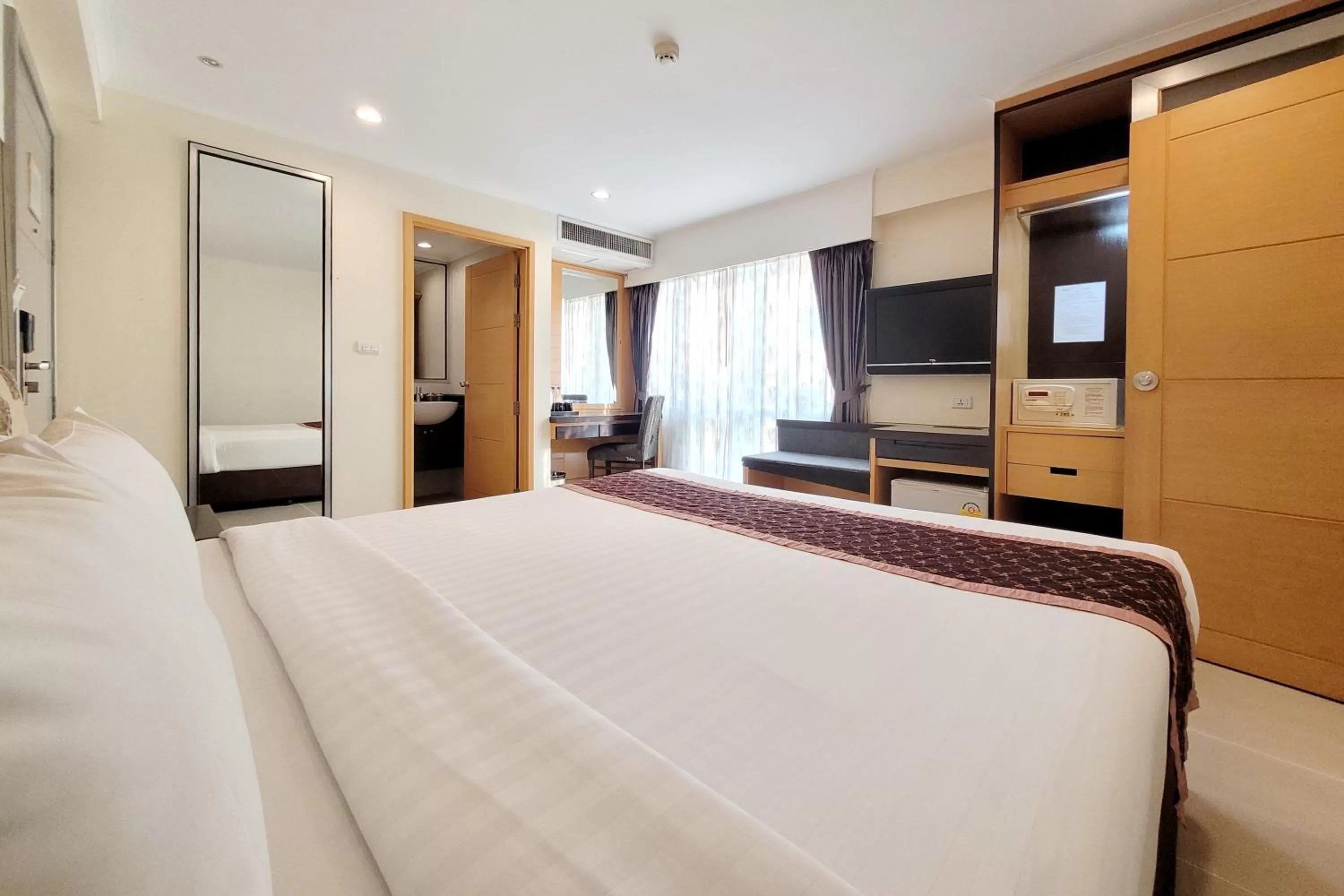 Bed in Citin Pratunam Bangkok by Compass Hospitality