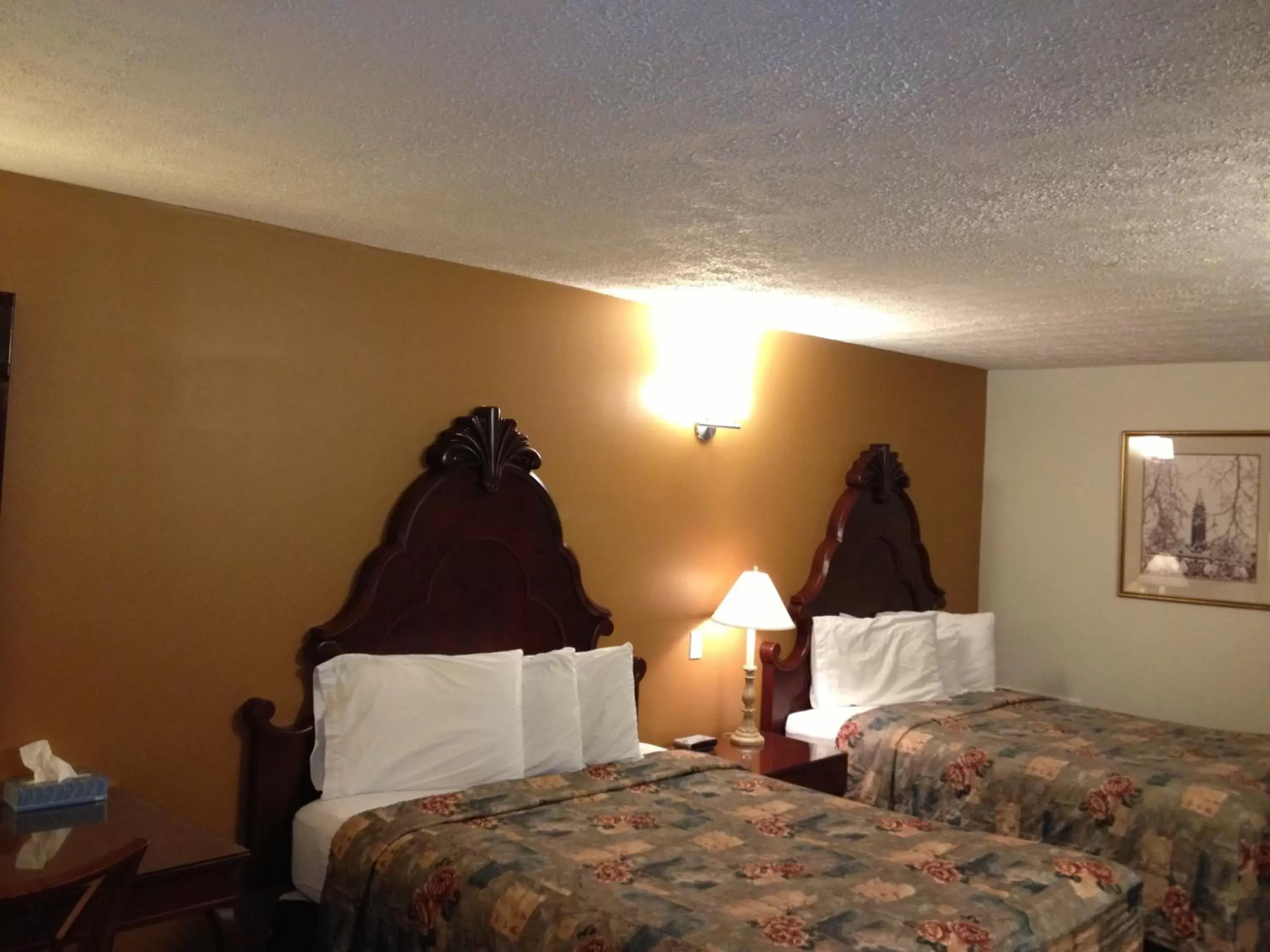 Queen Room with Two Queen Beds in Midtown Motel & Suites Queen Room with Two Queen Beds in Midtown Motel & Suites
