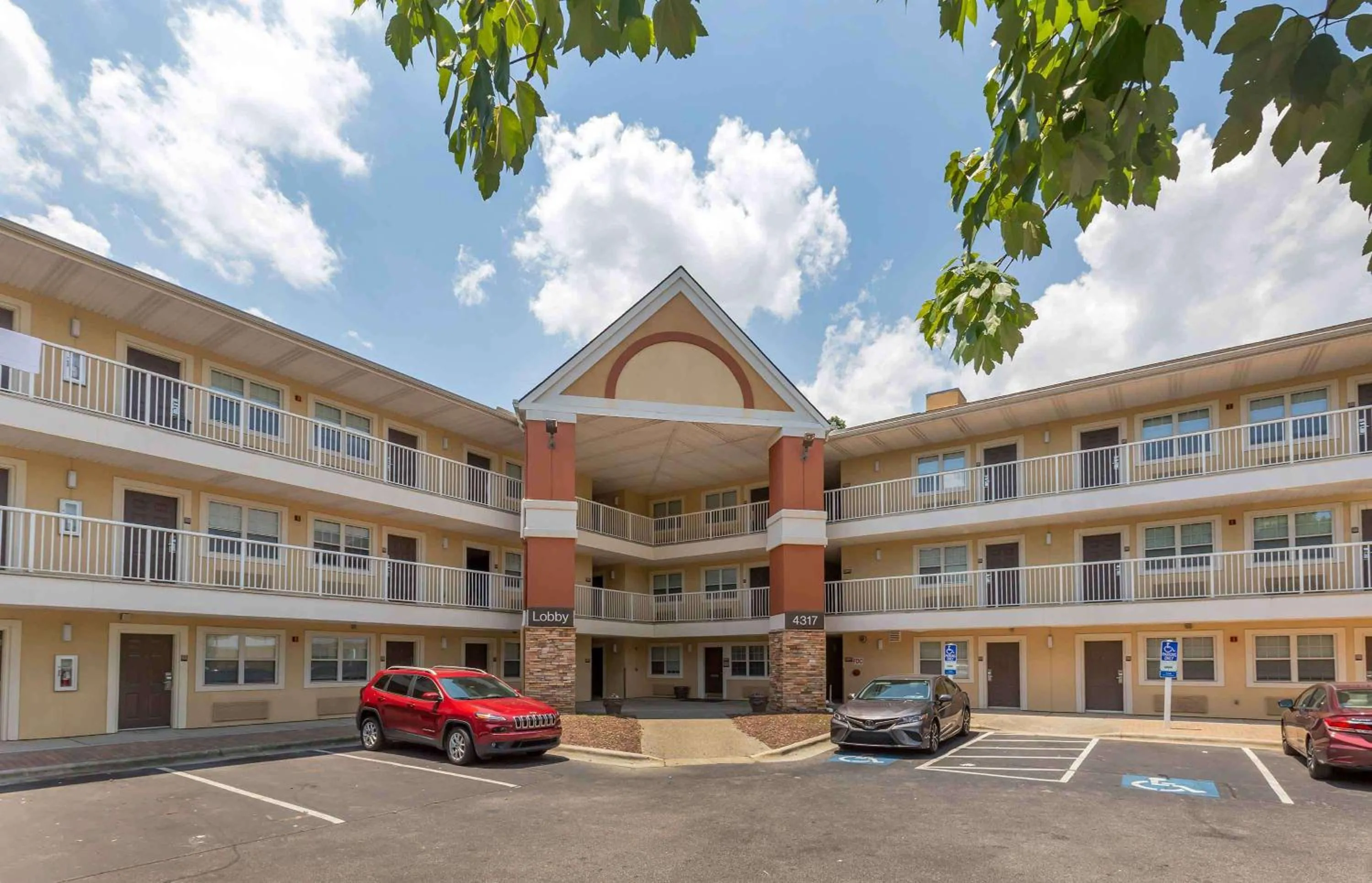 Property building in Extended Stay America Select Suites - Greensboro - Wendover Ave - Big Tree Way