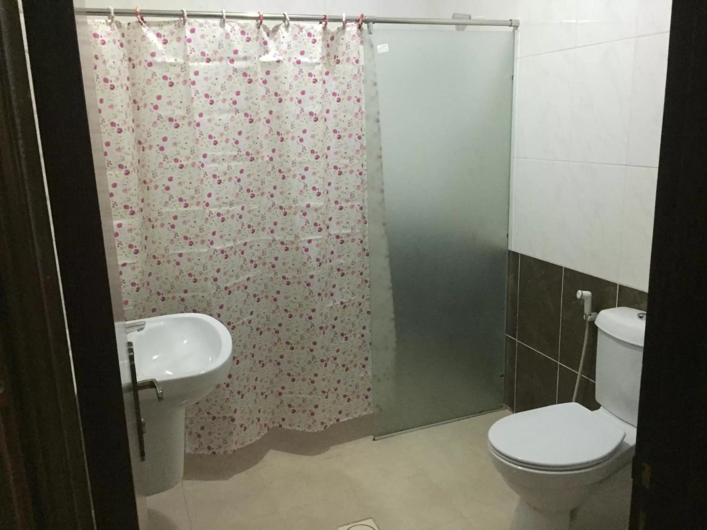 Shower in Al Tawheed Hotel Apartments