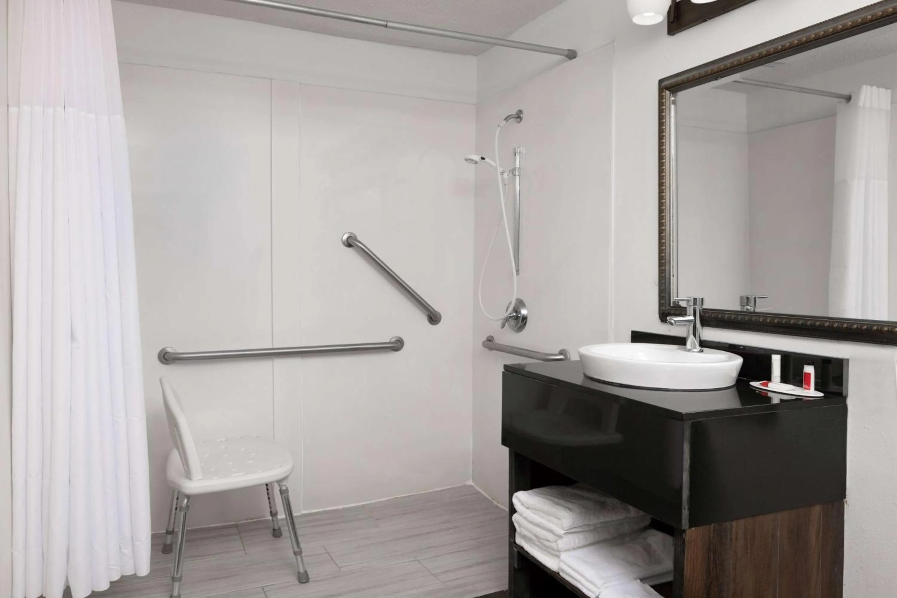 Shower in Super 8 by Wyndham Pensacola