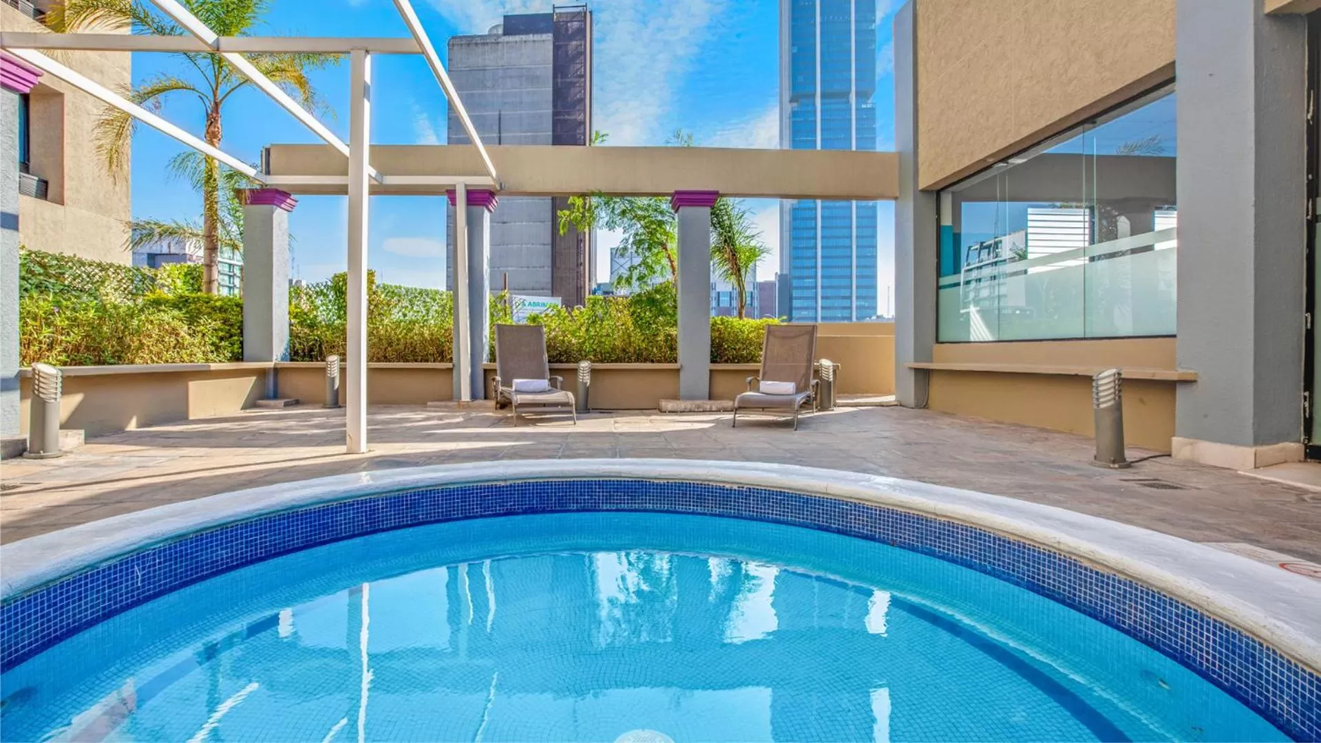 Swimming pool in CHN Hotel Monterrey Centro, Trademark Collection by Wyndham