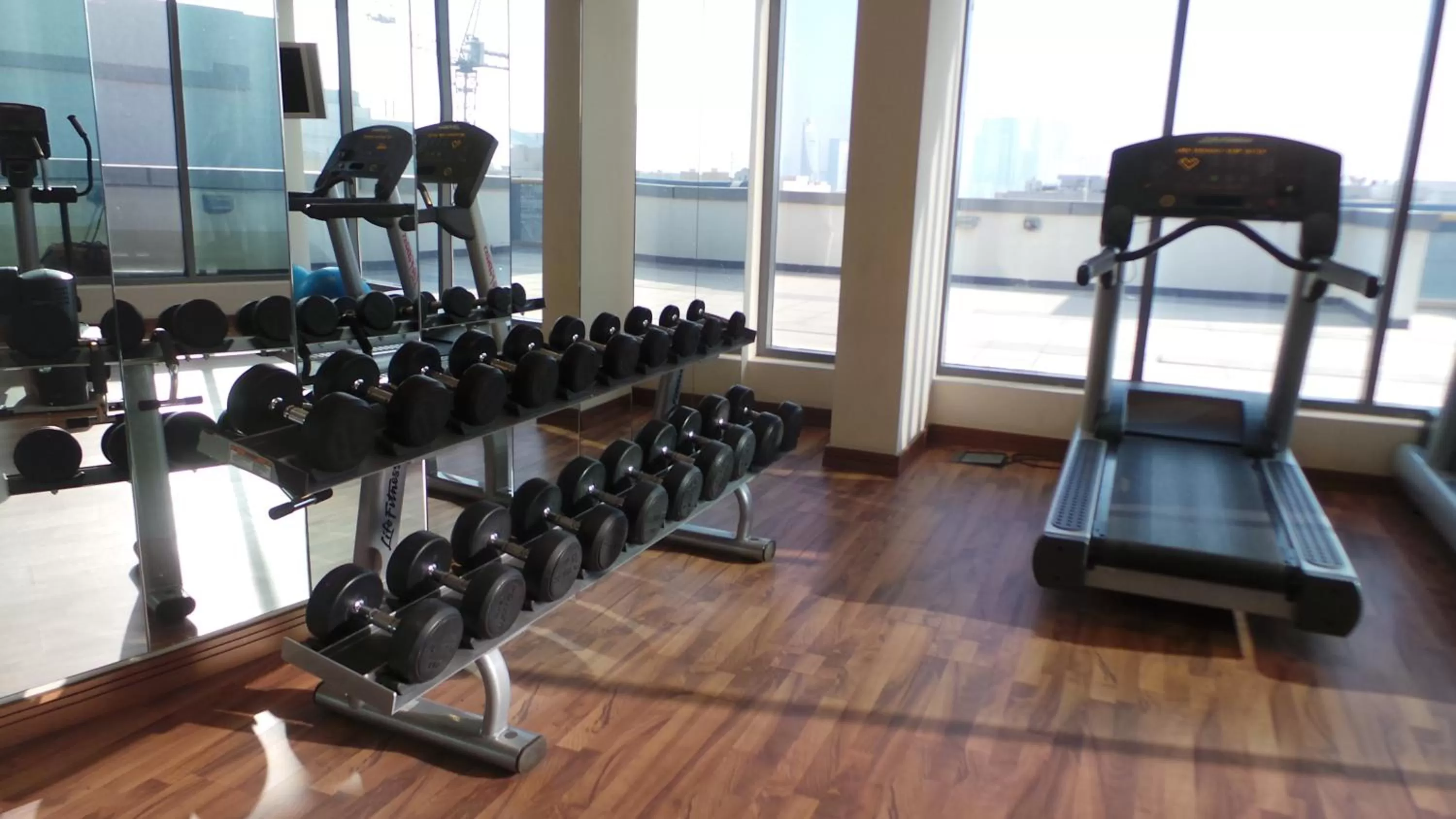 Fitness centre/facilities in Xclusive Maples Hotel Apartment