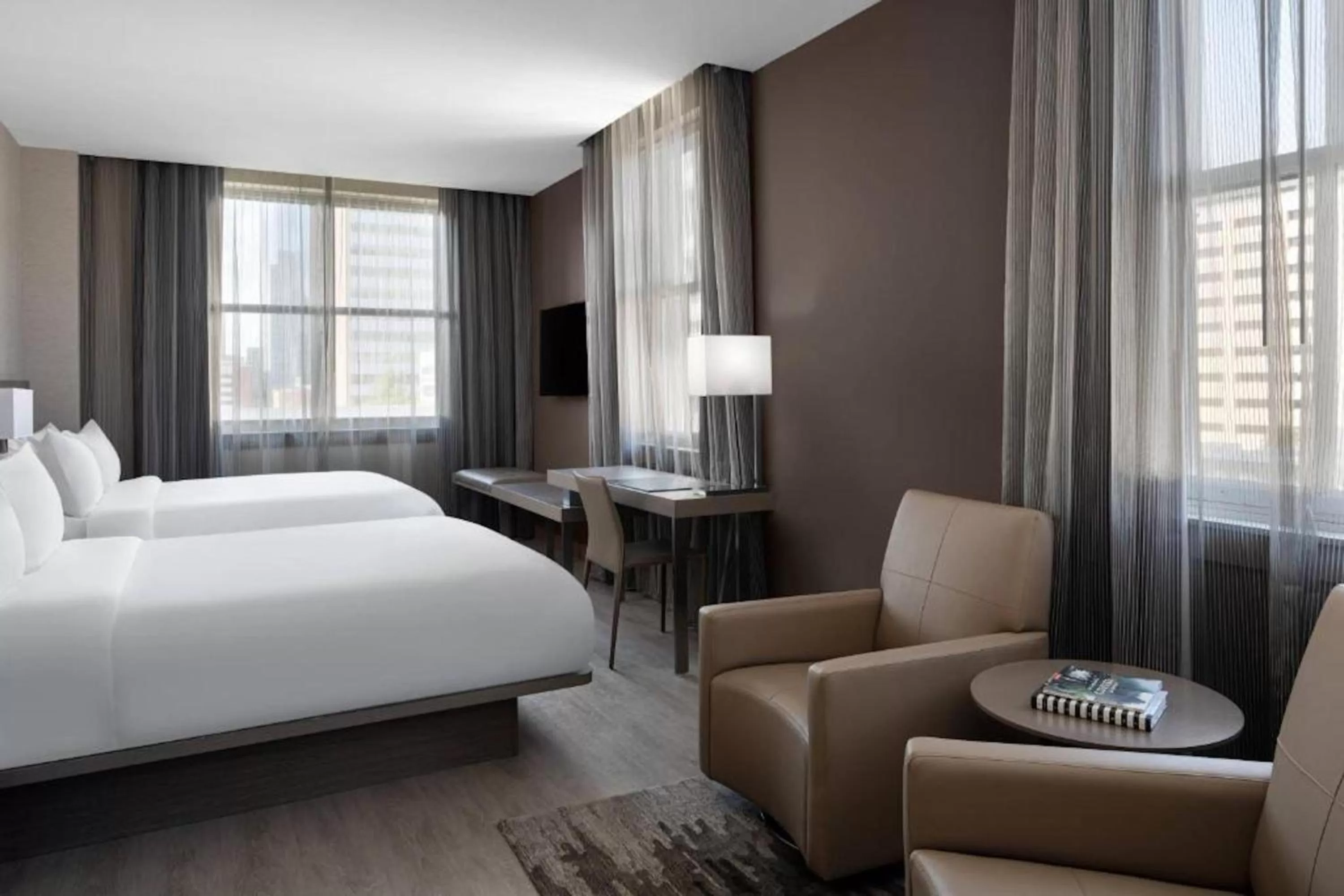 Bed in AC Hotel by Marriott Little Rock Downtown