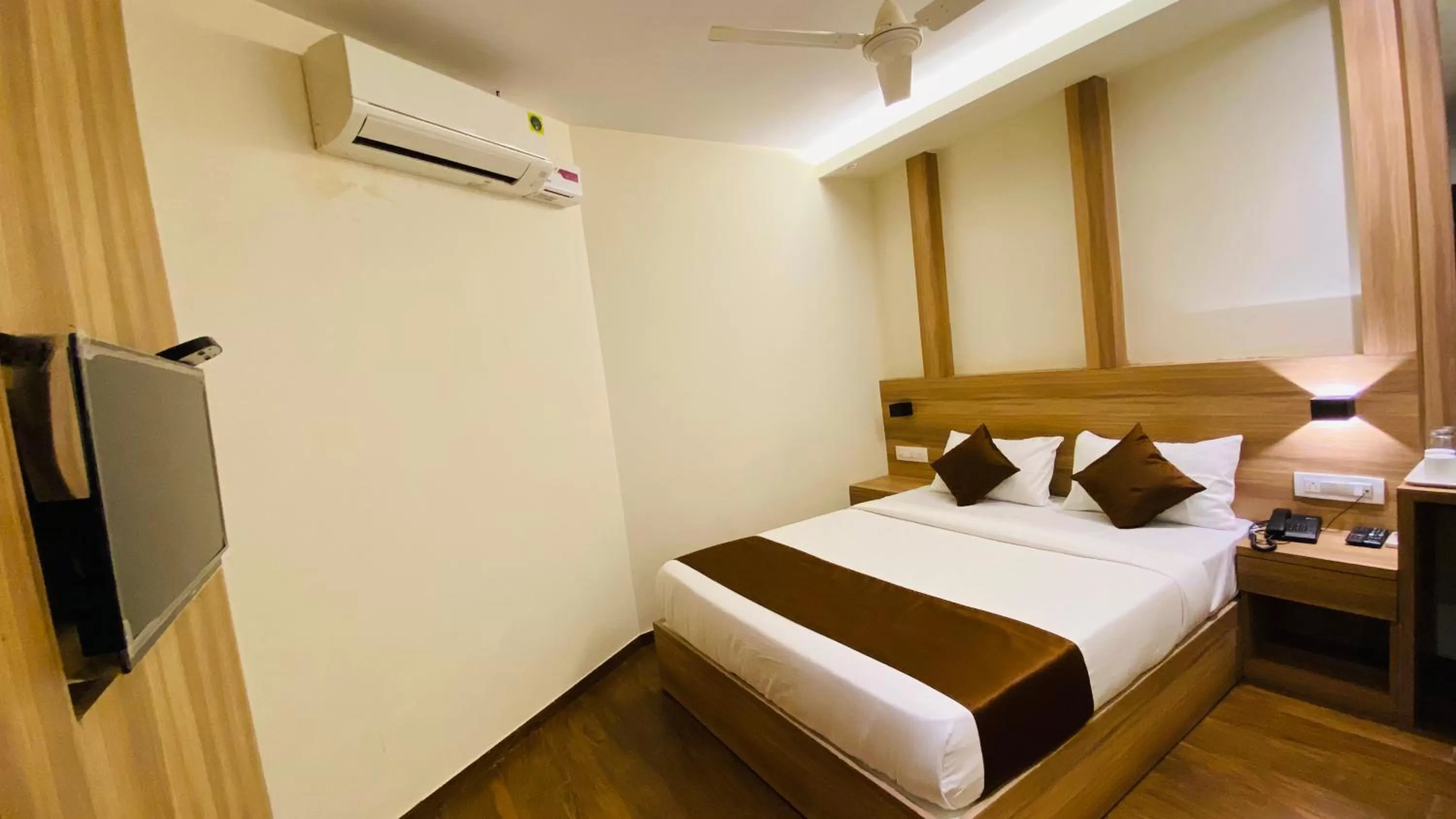 Bed in Hotel Plaza Heights by RAK Rooms, Mangaluru
