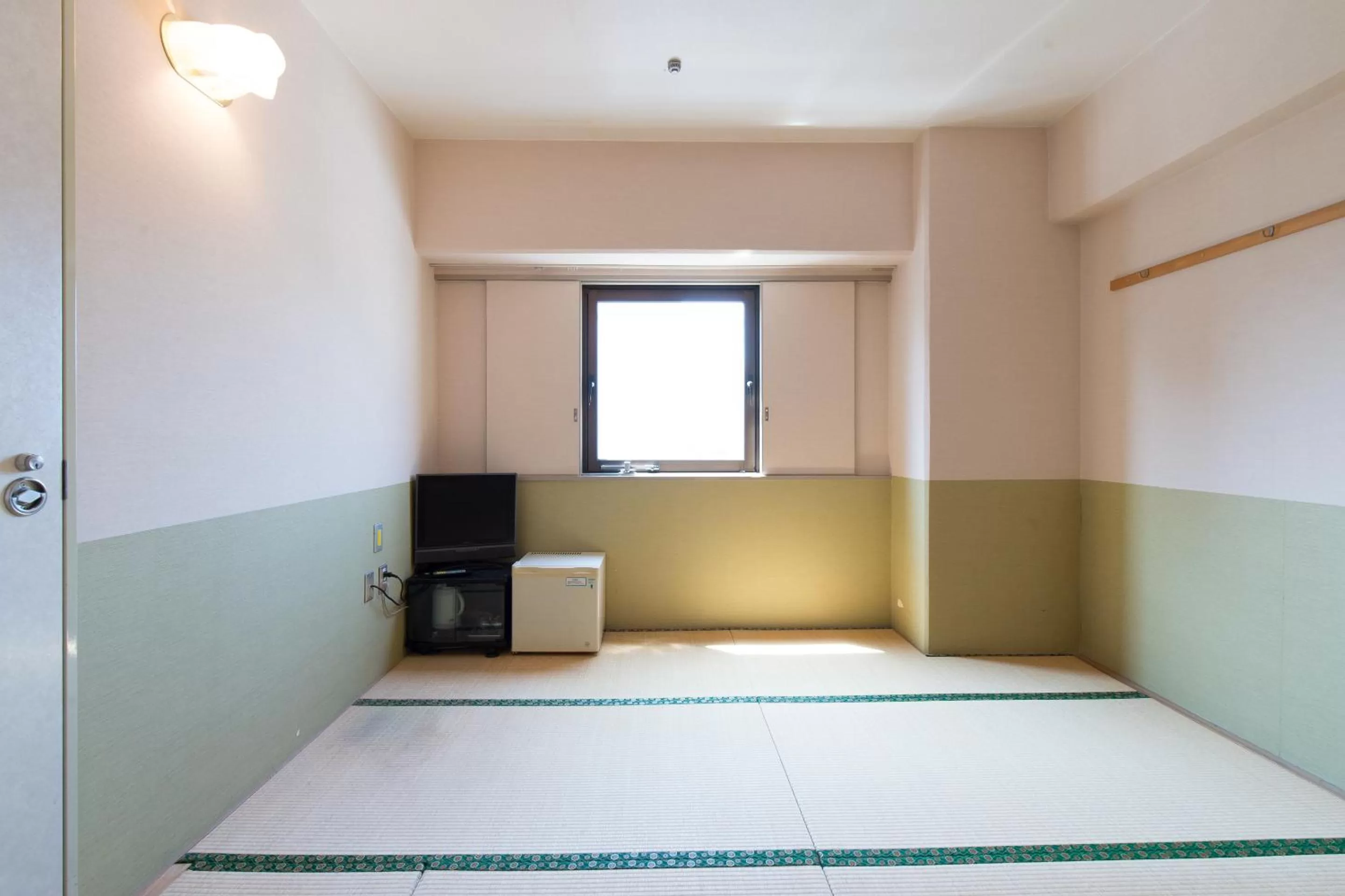 Photo of the whole room, Bed in Tabist Hotel Tetora Kitakyushu