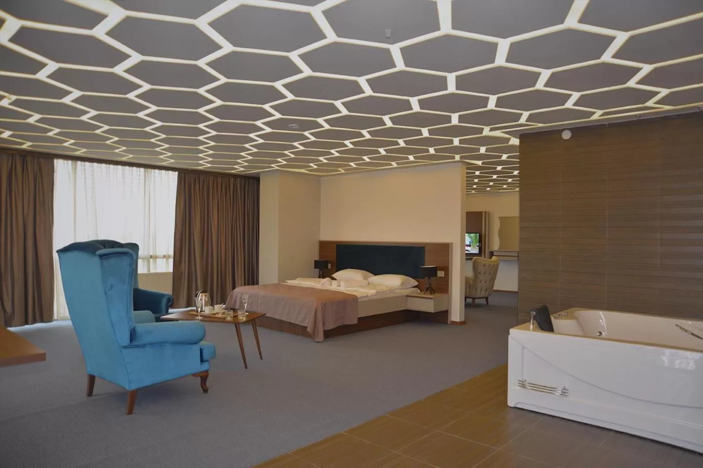 Bed in TEVETOGLU HOTEL