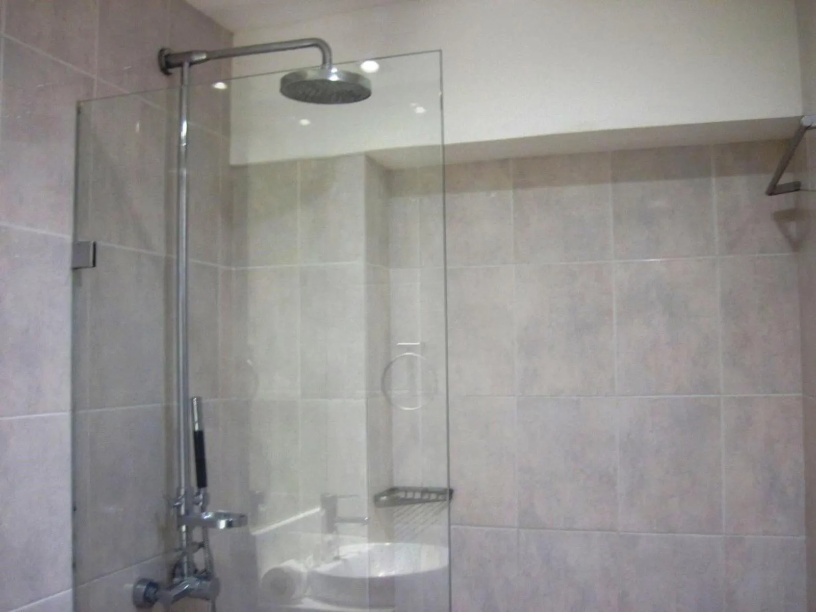 Shower in Tyche Boutique Hotel