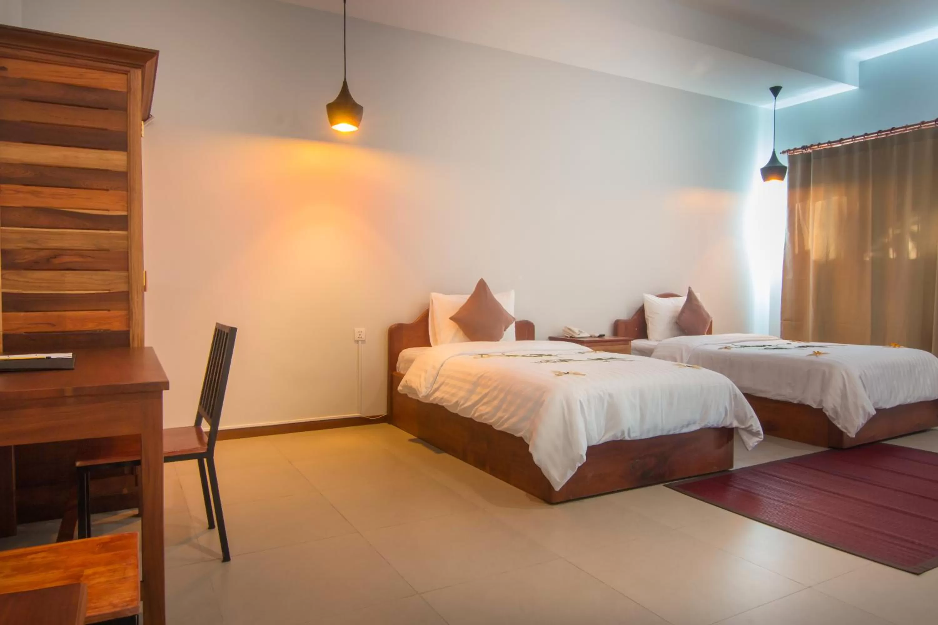 Bed in Indra Porak Residence Hotel