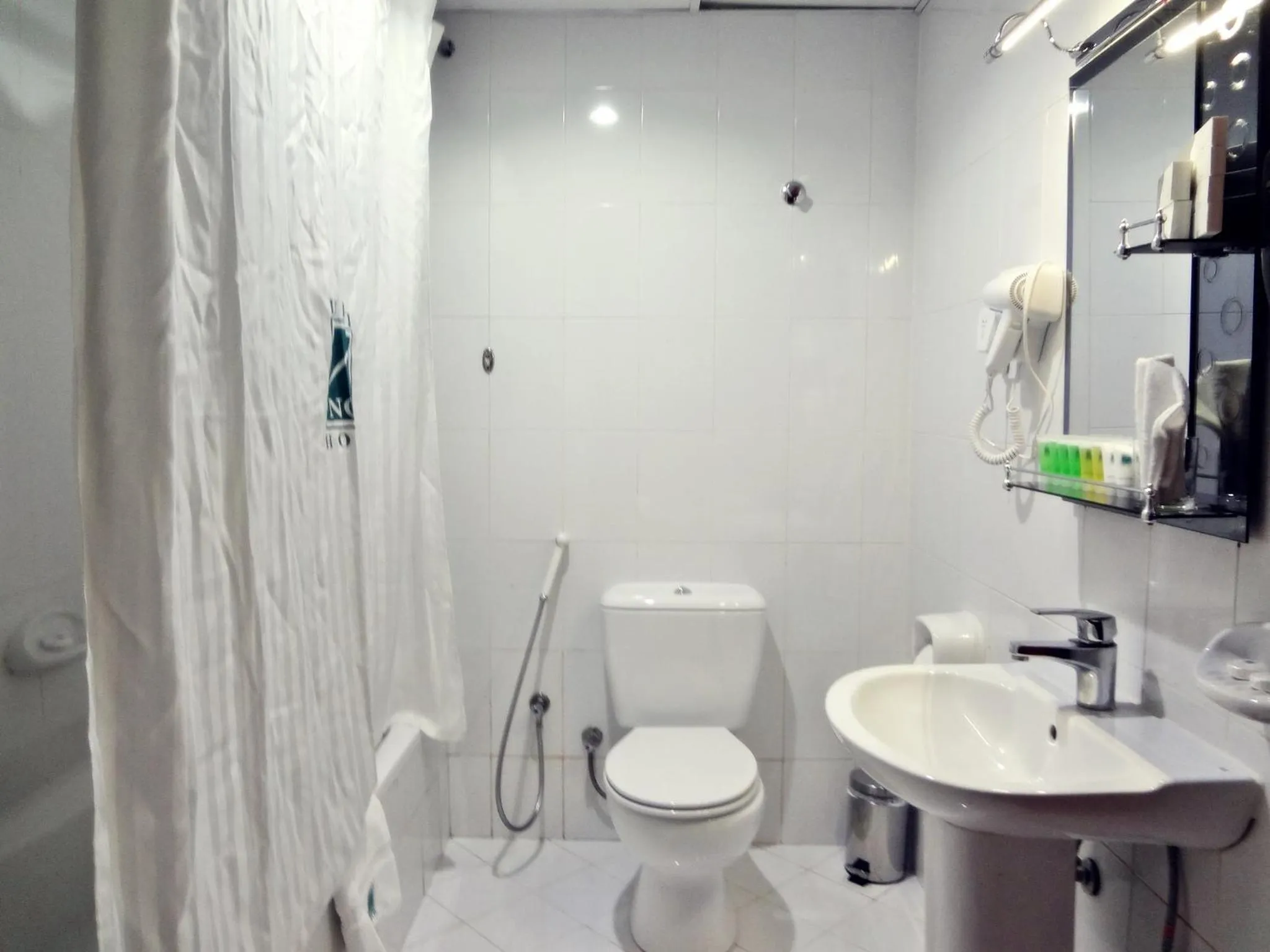 Bathroom in Grand Nova Hotel