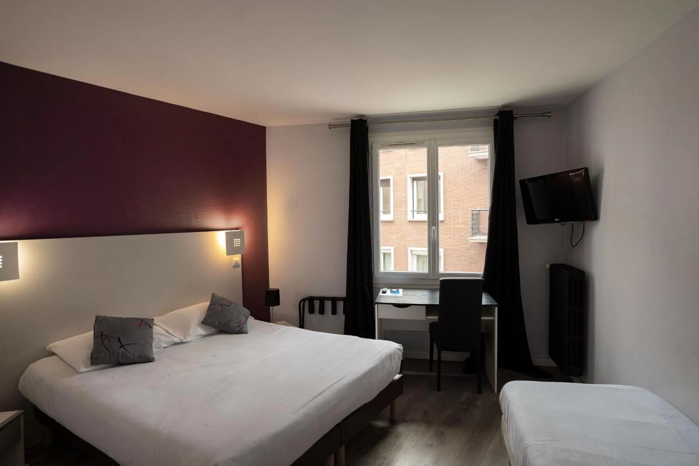 Bed in Hotel De Quebec