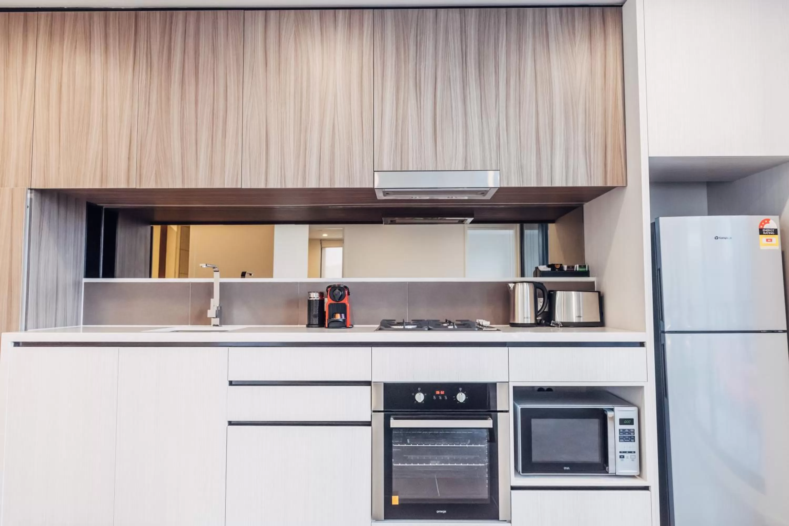 Kitchen or kitchenette in Comfort Apartments Box Hill