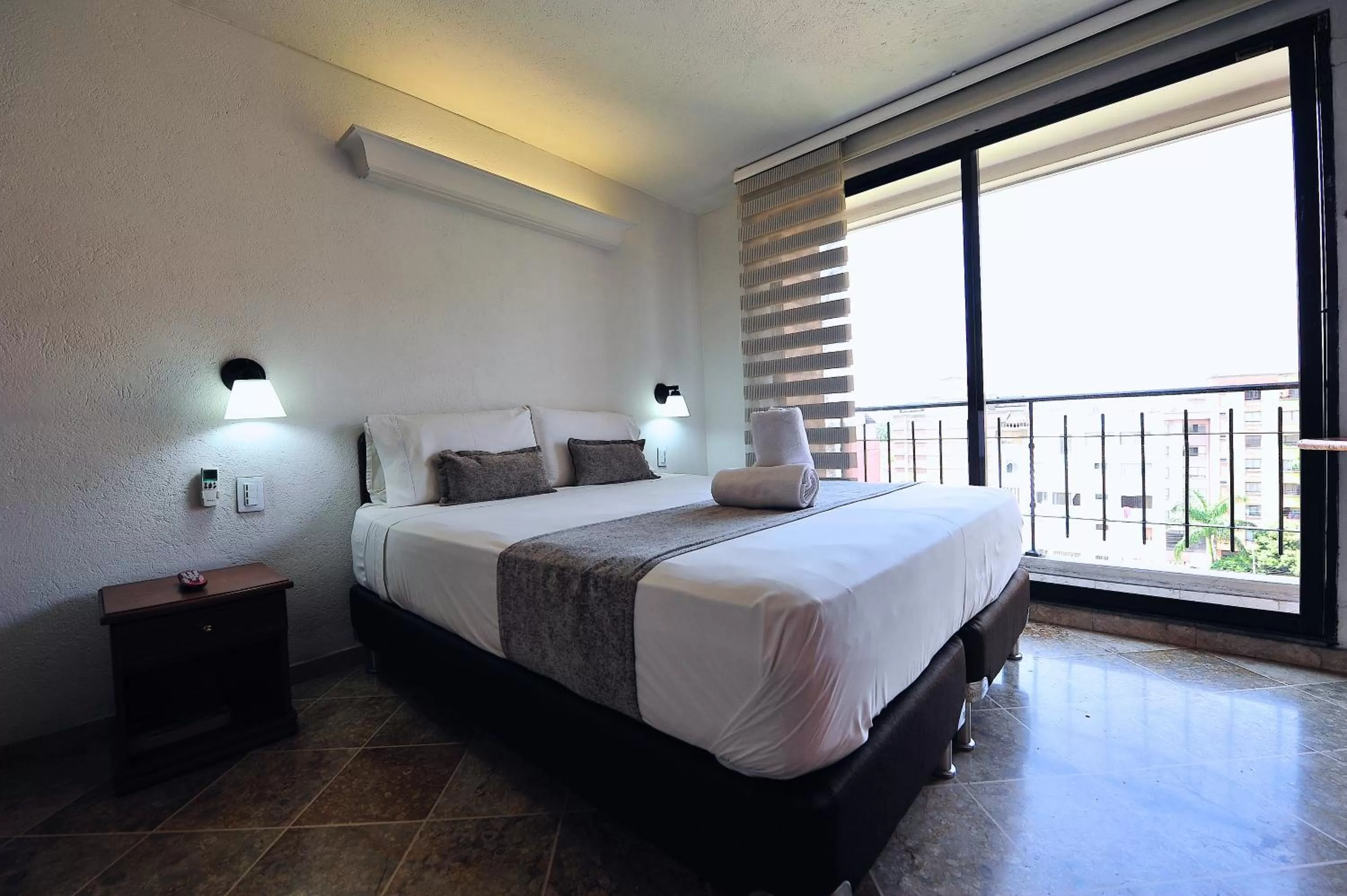 Photo of the whole room, Bed in Hotel Cabo de la Vela Medellin