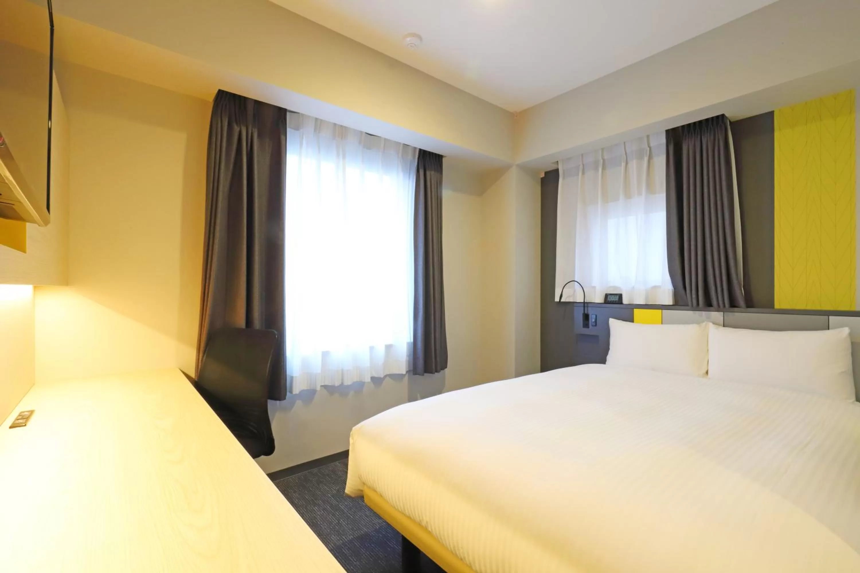 Bed in Smile Hotel Utsunomiya Nishiguchi Ekimae