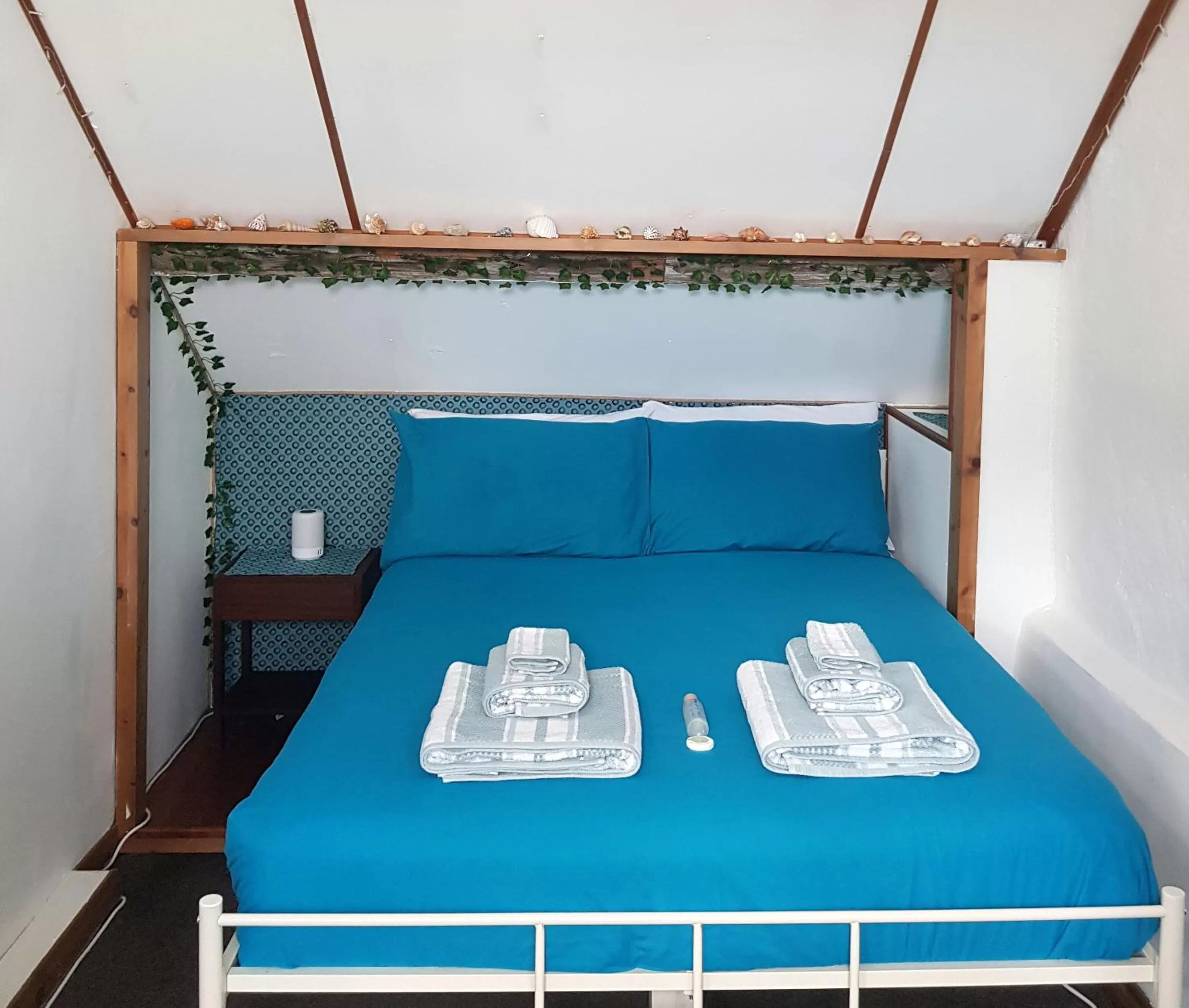 Bed in Middle Cottage Sandy Haven Beach