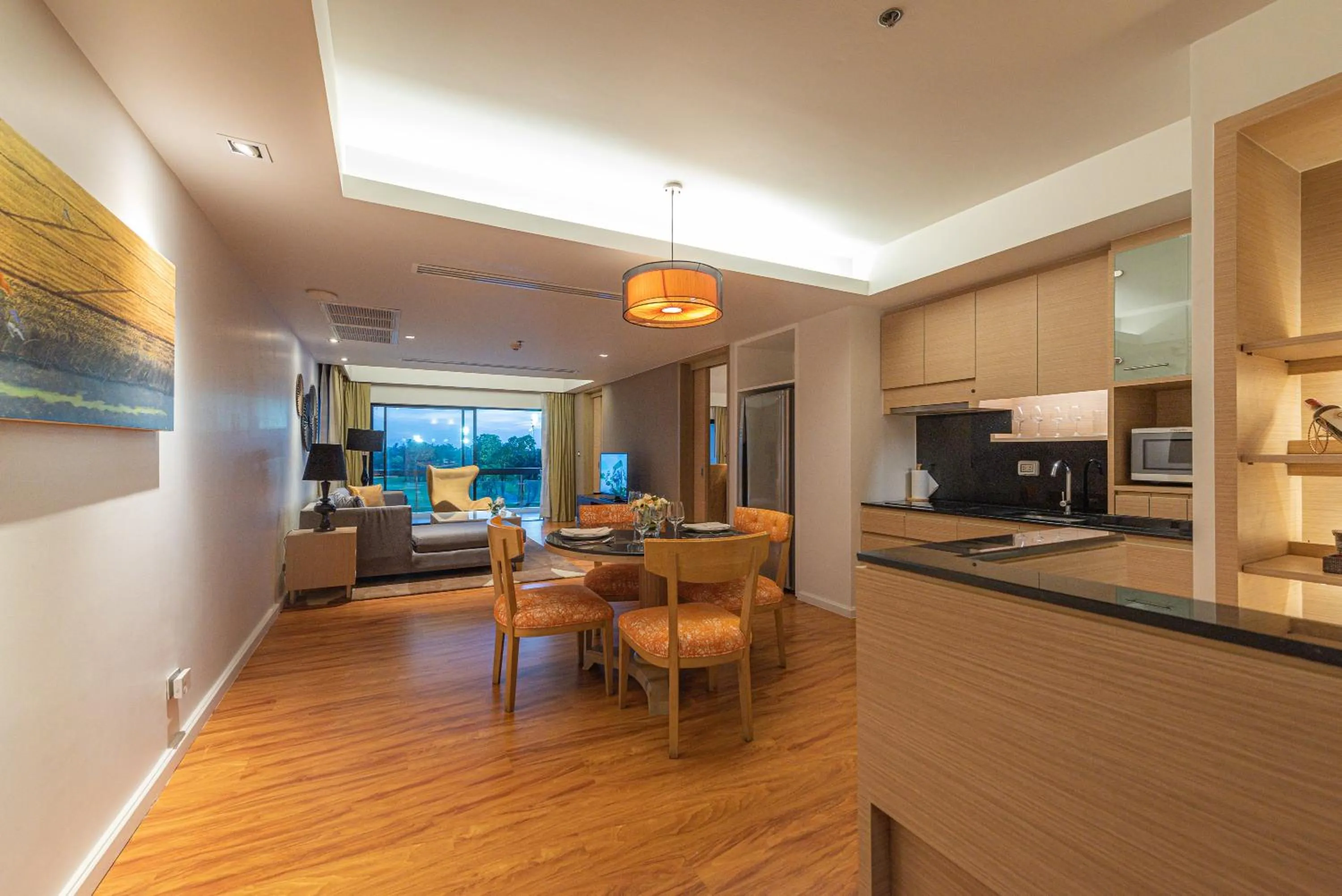 Living room in Summit Windmill Golf Suite Hotel at Suvarnabhumi