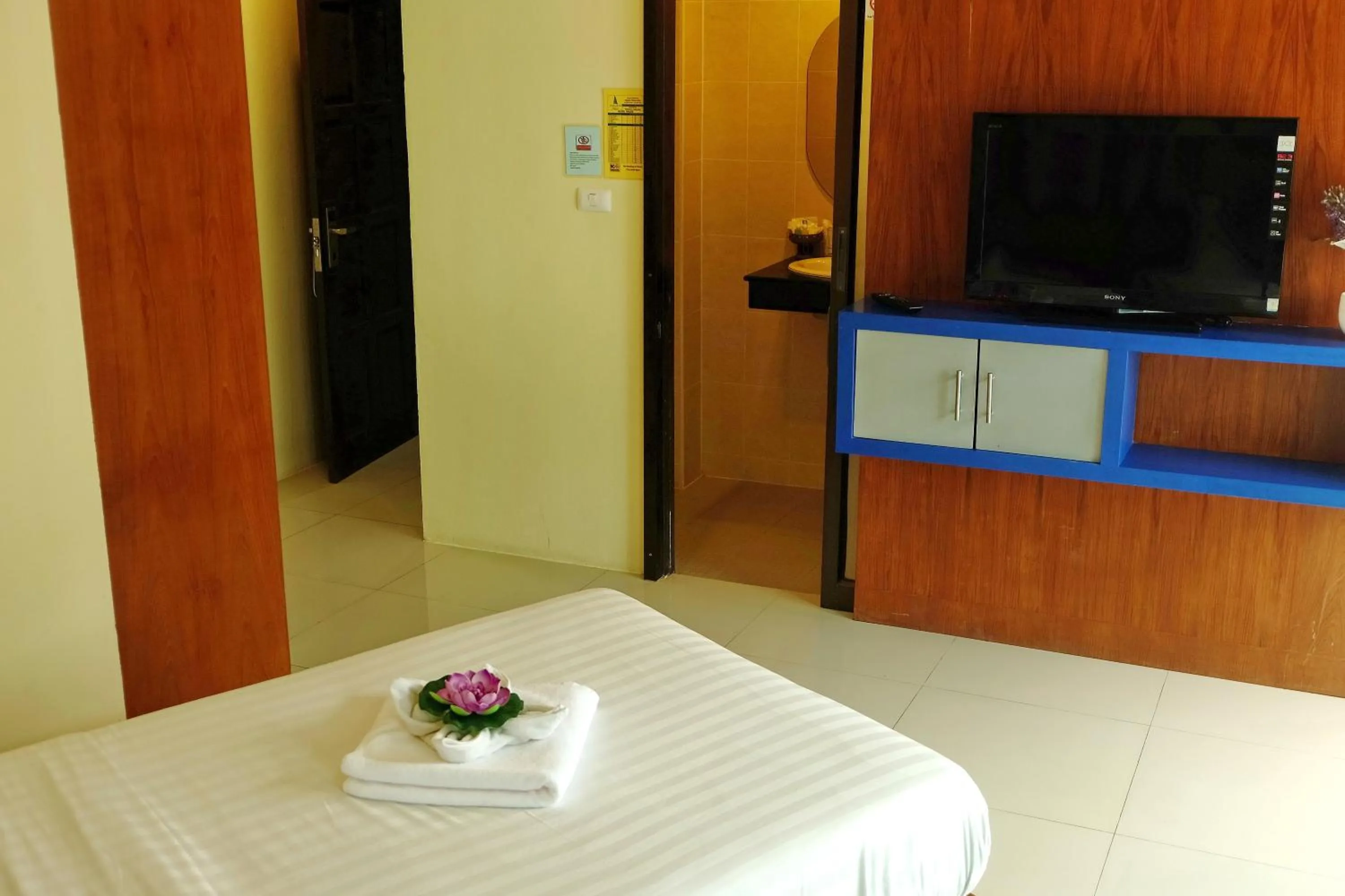 Bed in Calypso Patong Hotel