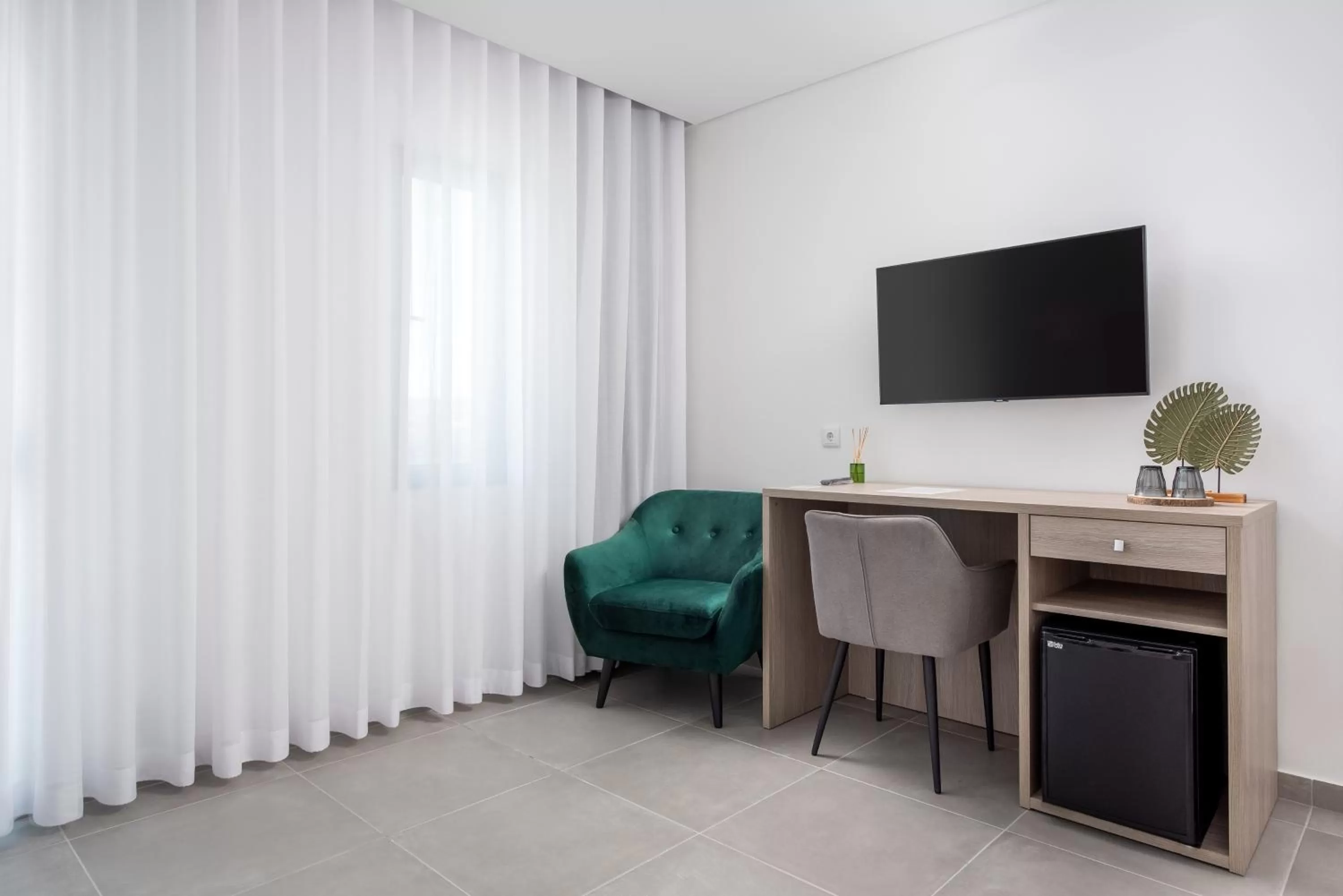 TV/Entertainment Center in Vila Luna B&B