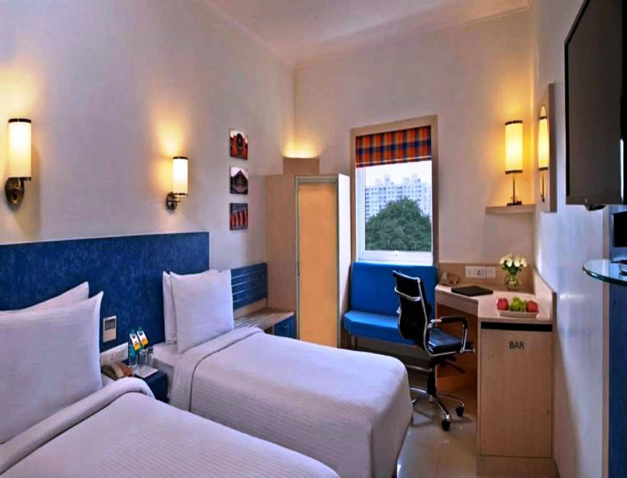 Bed in Nirwana Hometel Jaipur- A Sarovar Hotel