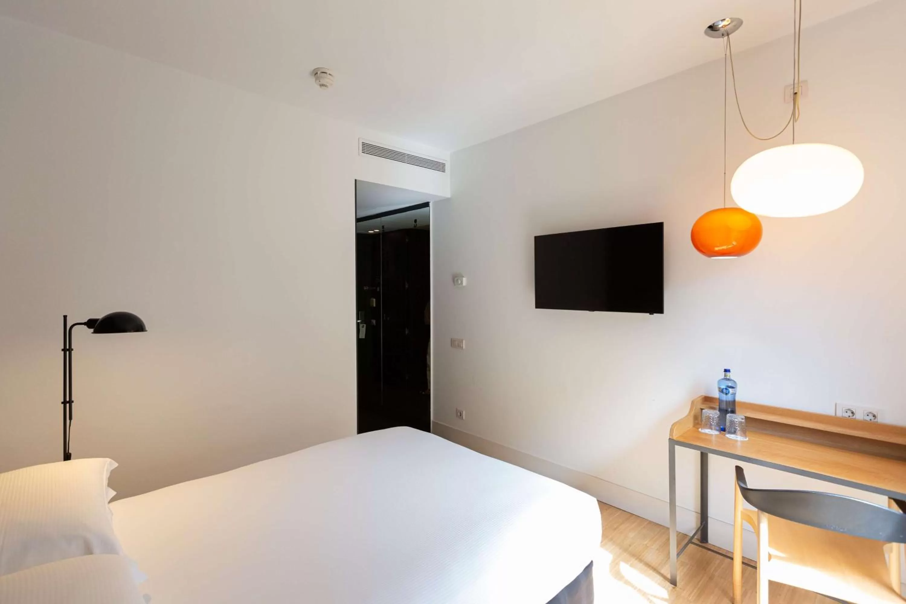 Bed in Alexandra Barcelona Hotel, Curio Collection by Hilton