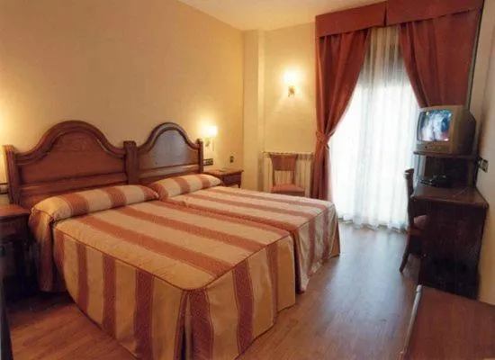 Photo of the whole room, Bed in Hotel Cristina