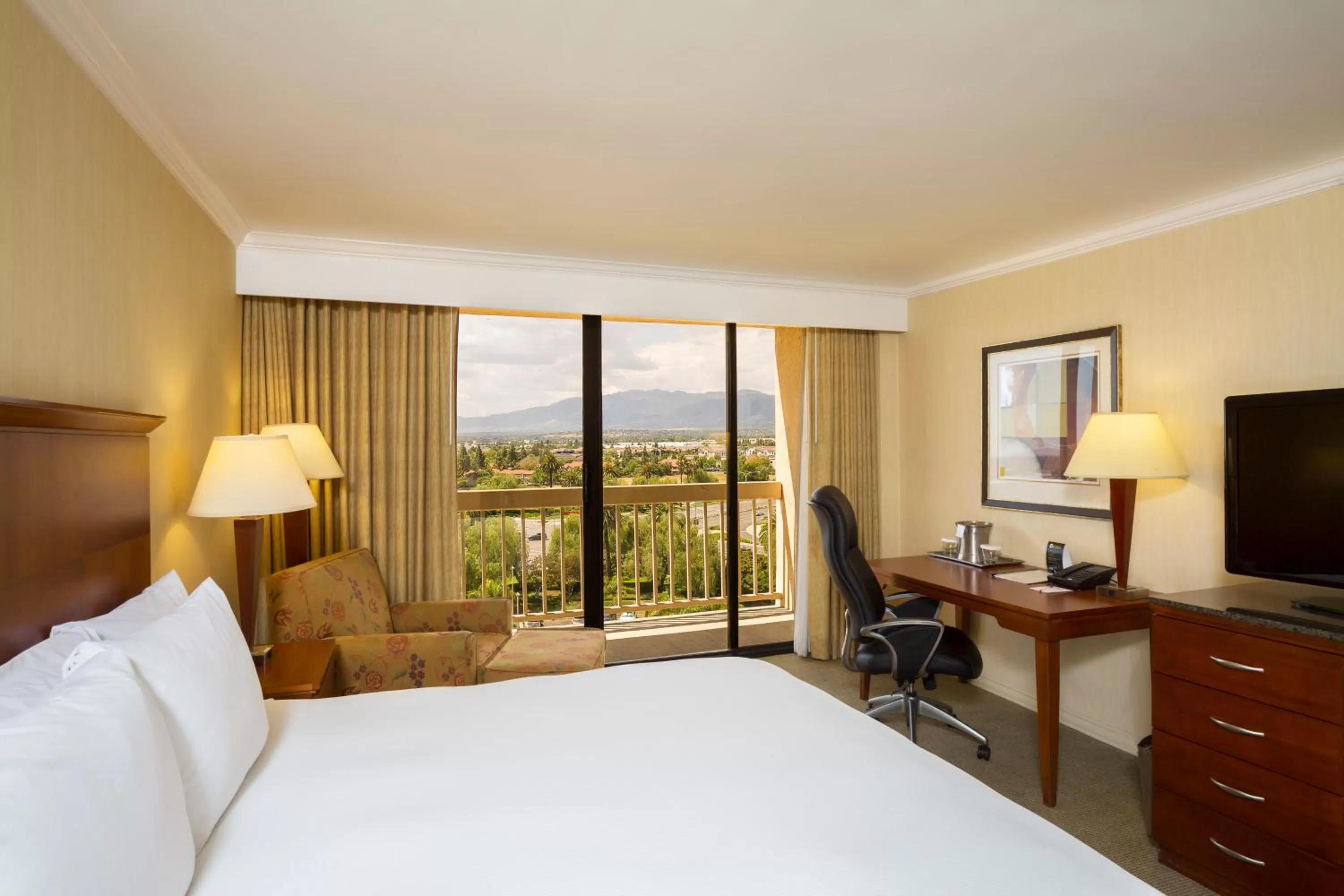 Photo of the whole room, Bed in Ontario Airport Hotel & Conference Center
