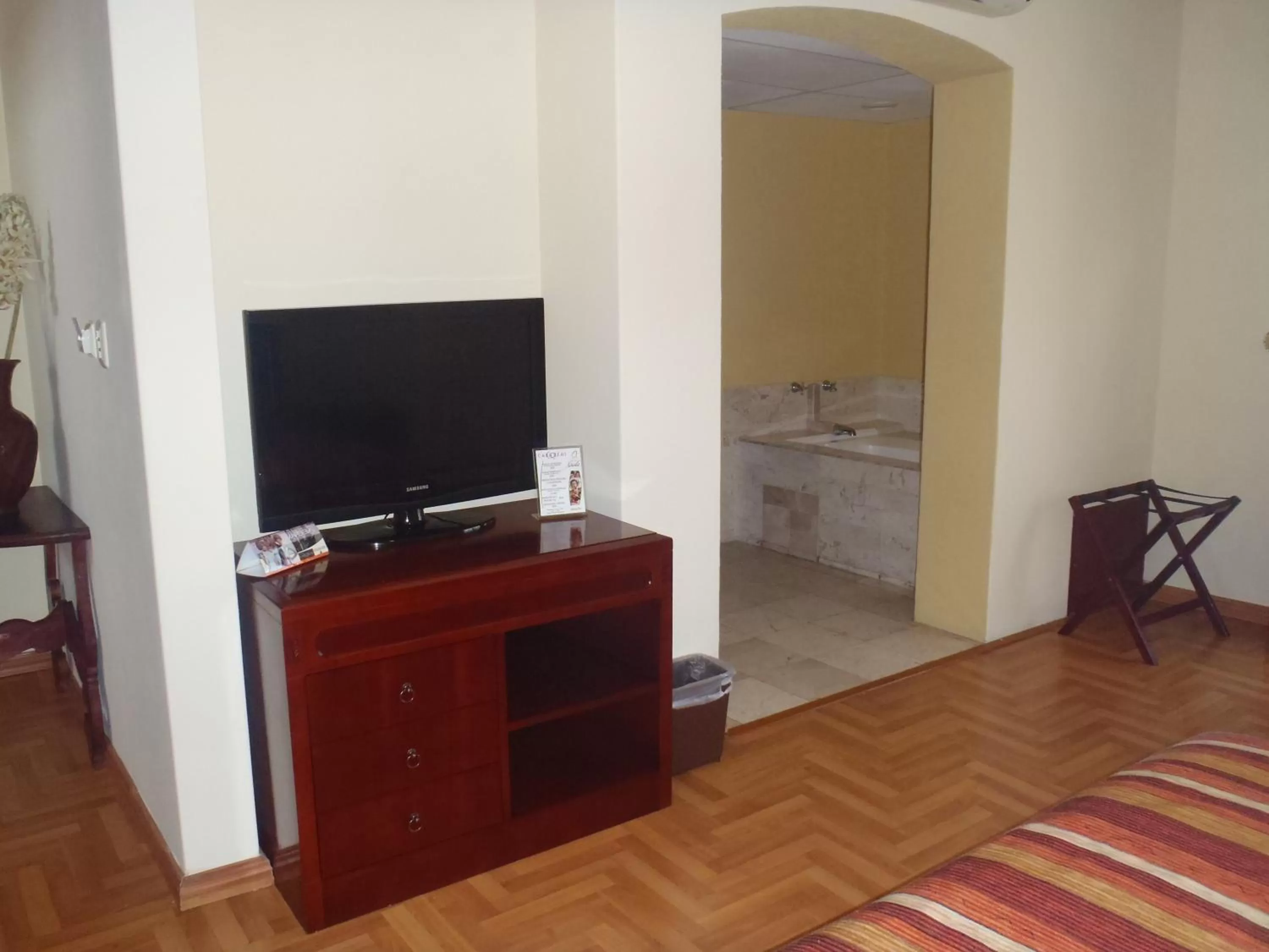 Photo of the whole room, TV/Entertainment Center in Hotel Casa Real Tehuacan