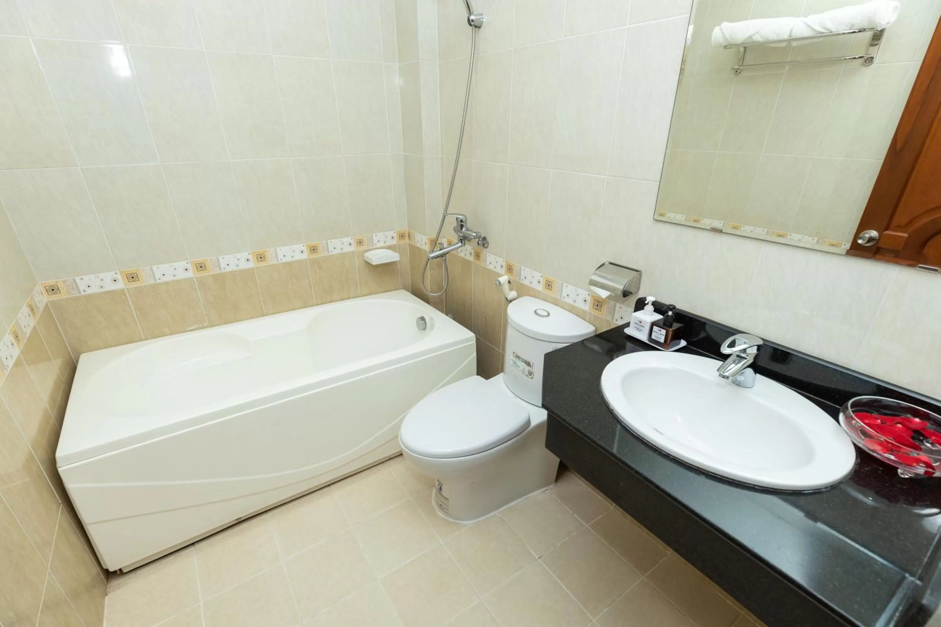 Toilet in Queen Garden Hotel & Apartment