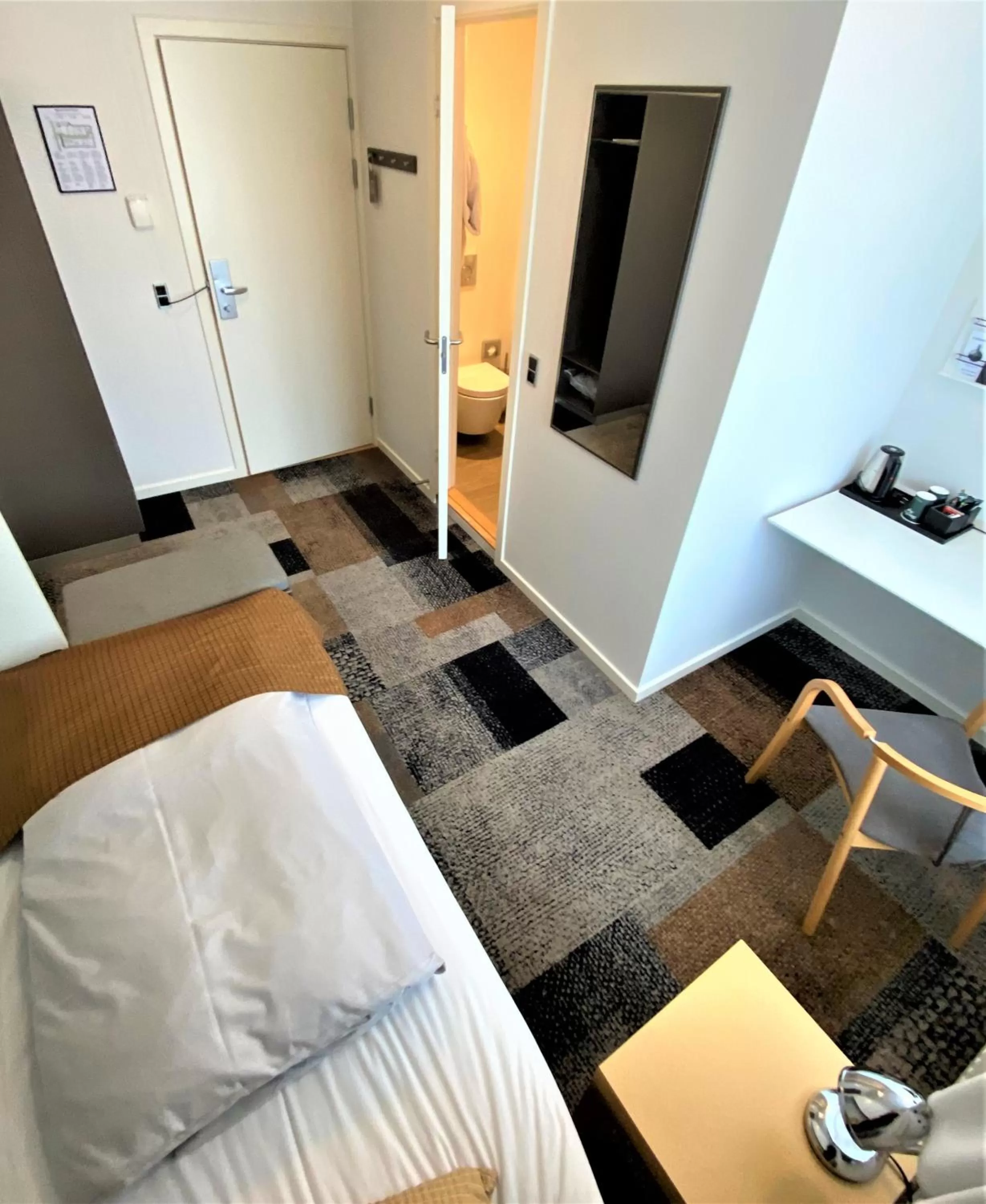 Bed in Hotel Skivehus