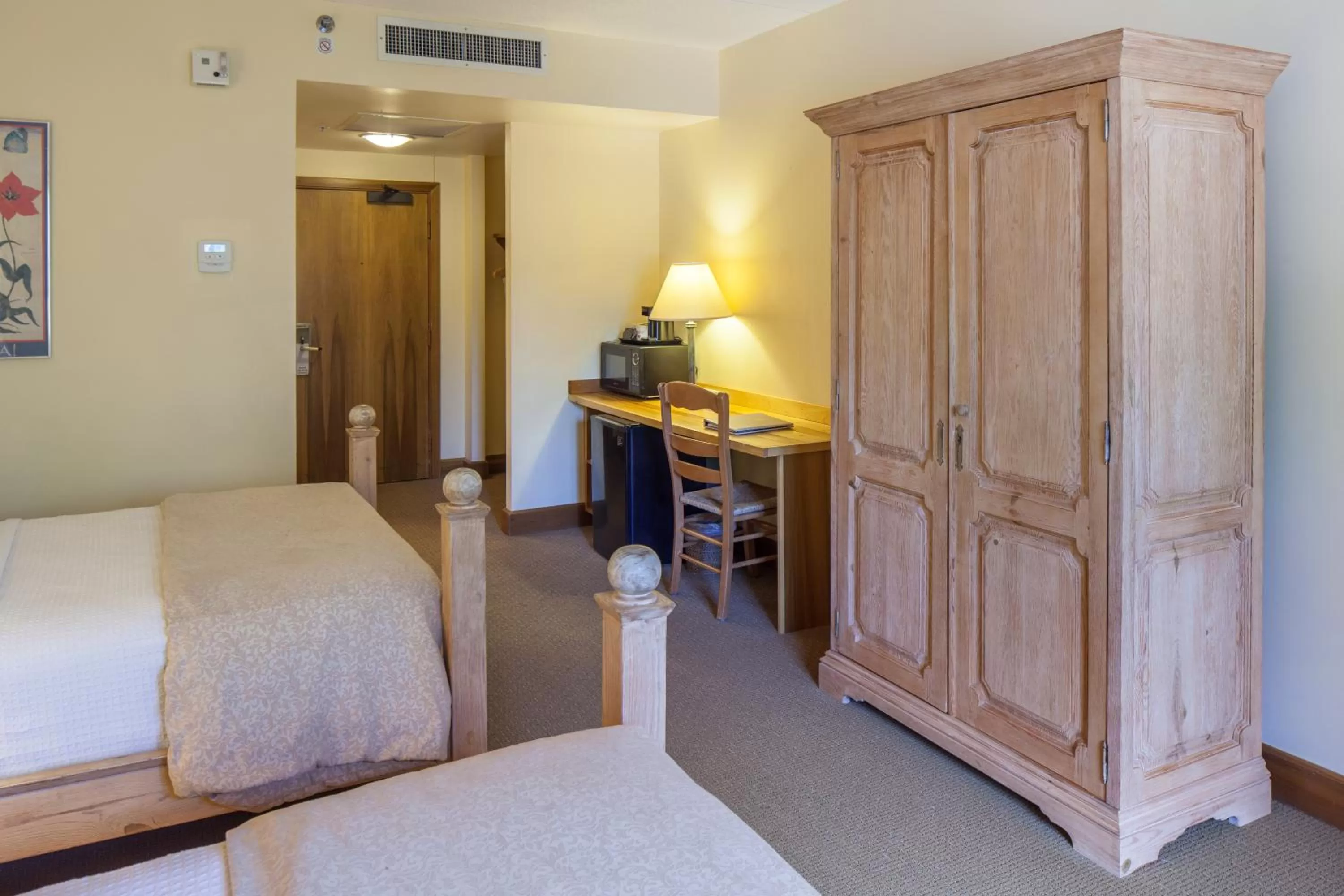 Bed in New Harmony Inn Resort and Conference Center