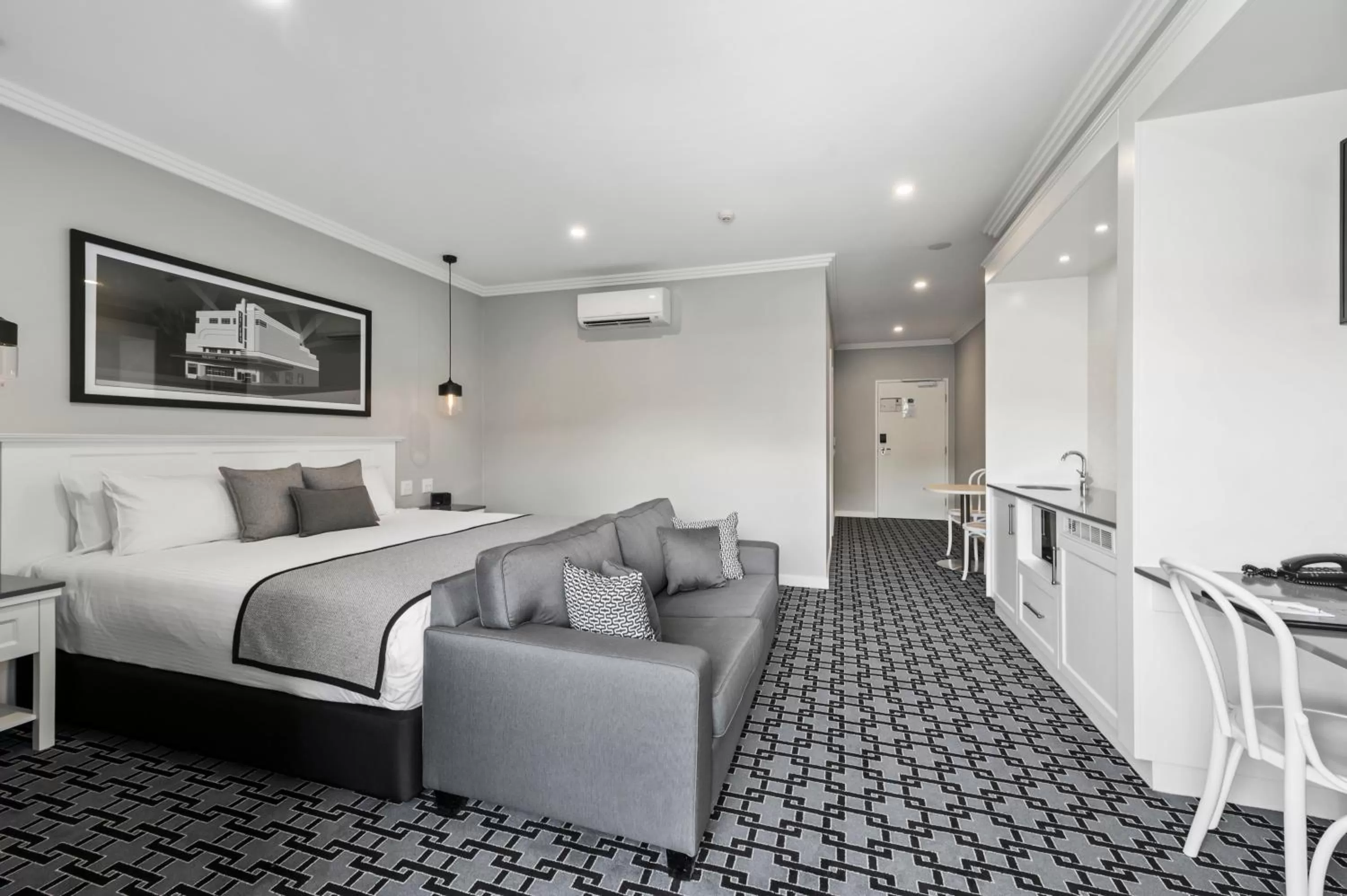 Photo of the whole room, Bed in CH Boutique Hotel & Apartments, an Ascend Collection Hotel