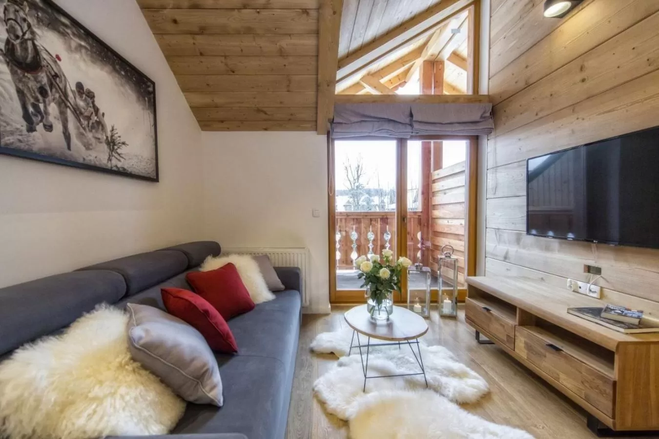 Communal lounge/ TV room in Aparthotel Giewont