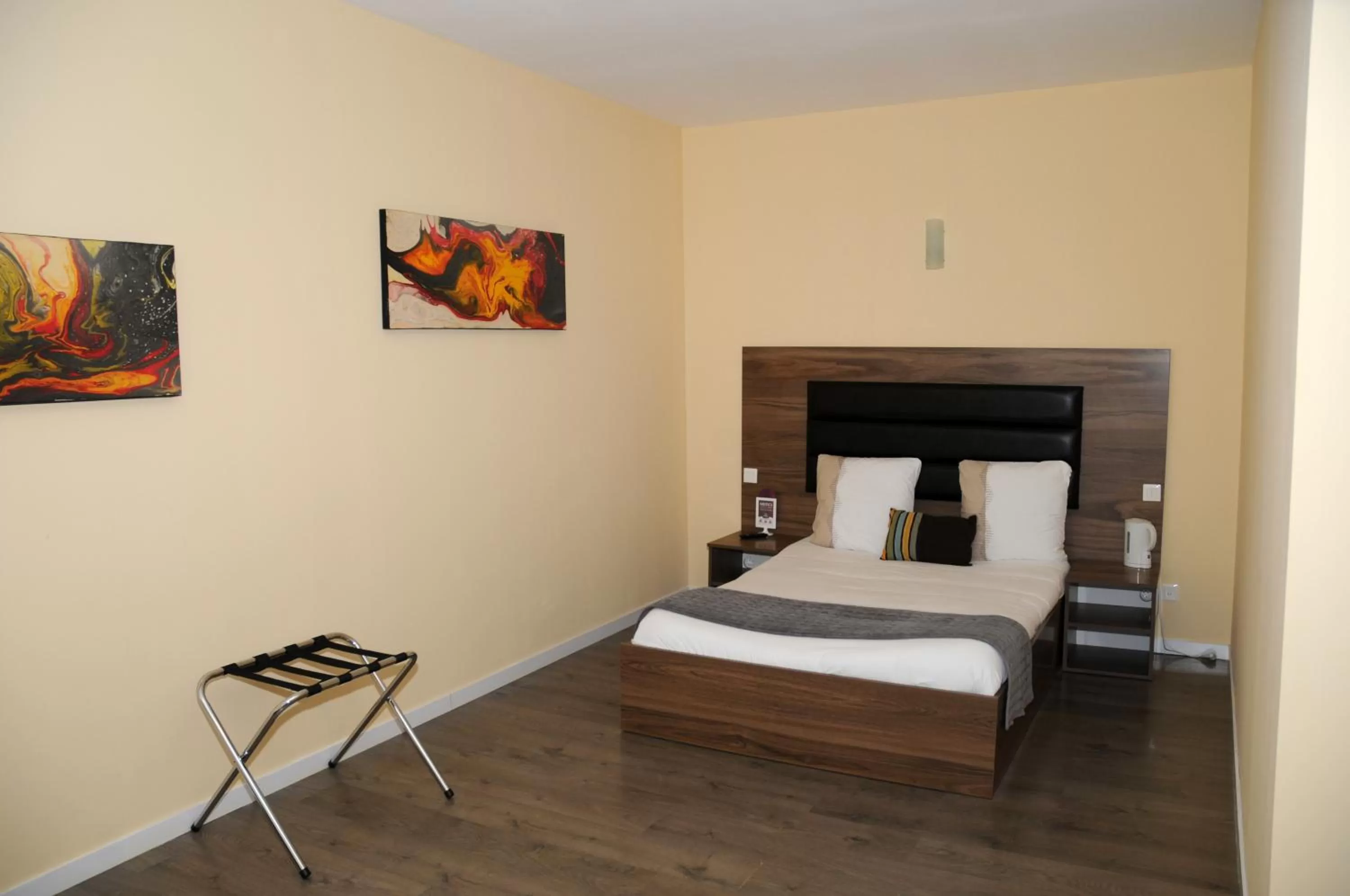 Bed, Room Photo in Kyriad Direct Morez