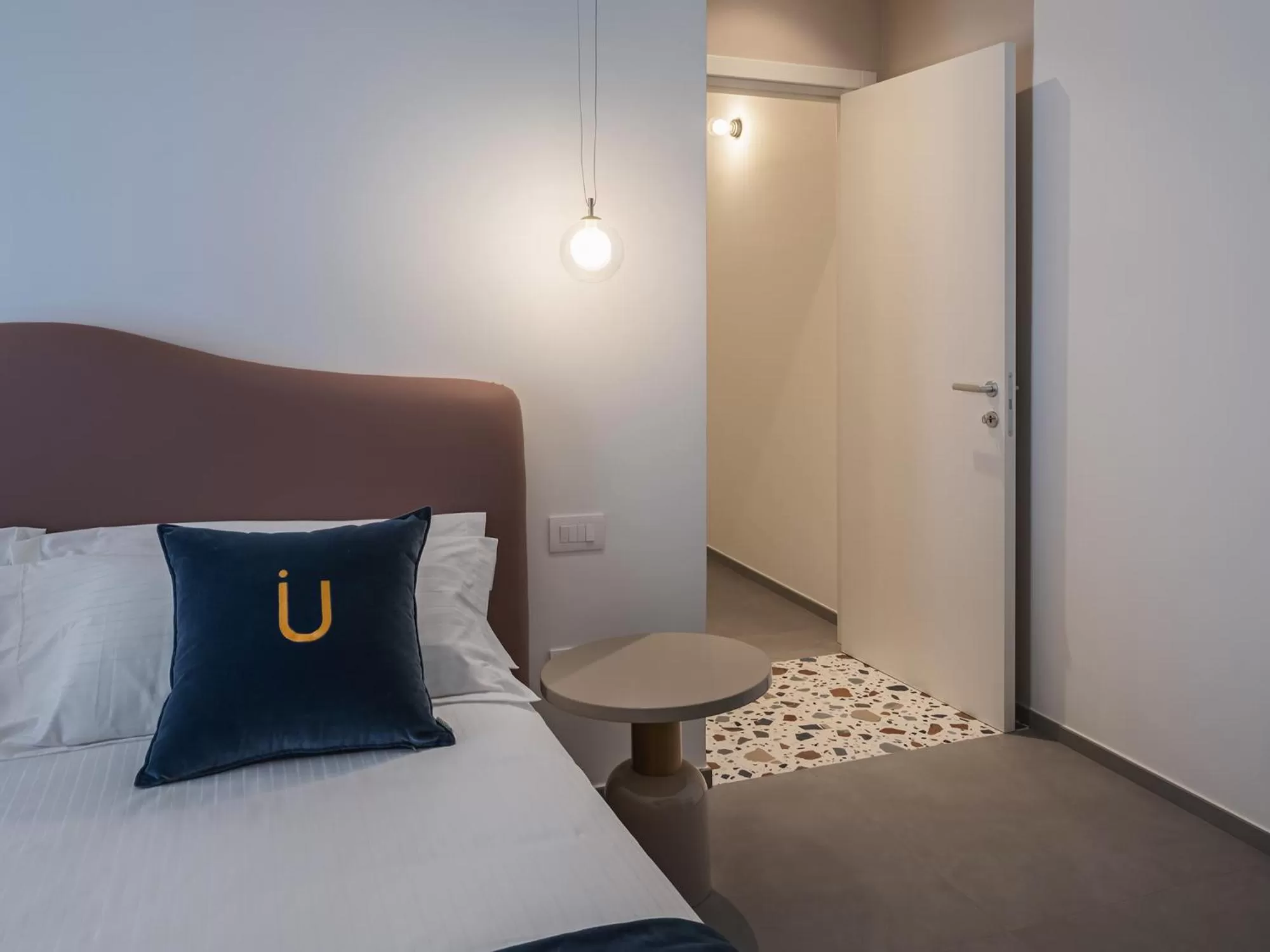 Photo of the whole room, Bed in Living u HomeSuites