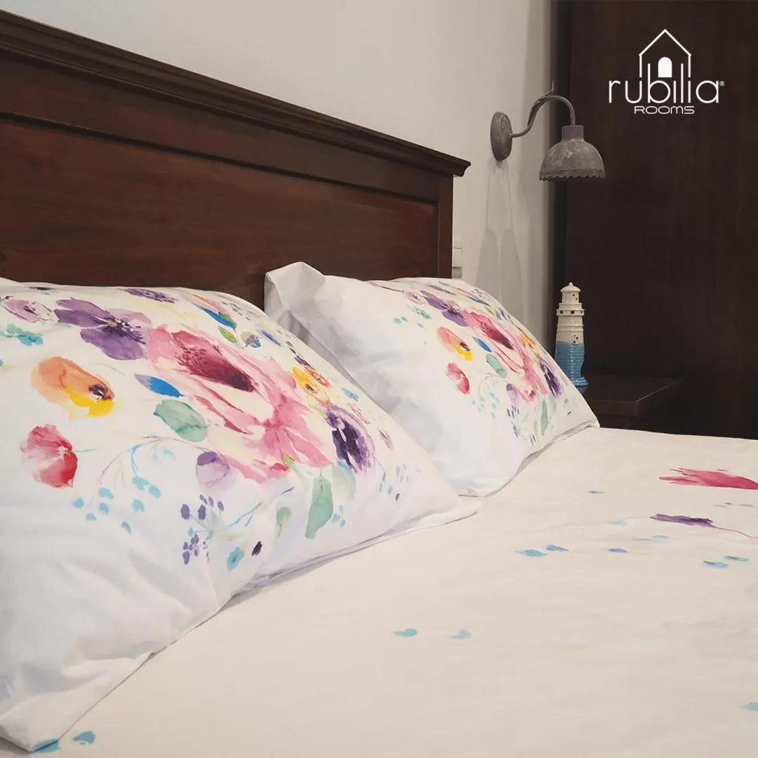 Bed in Rubilia Rooms Pompei