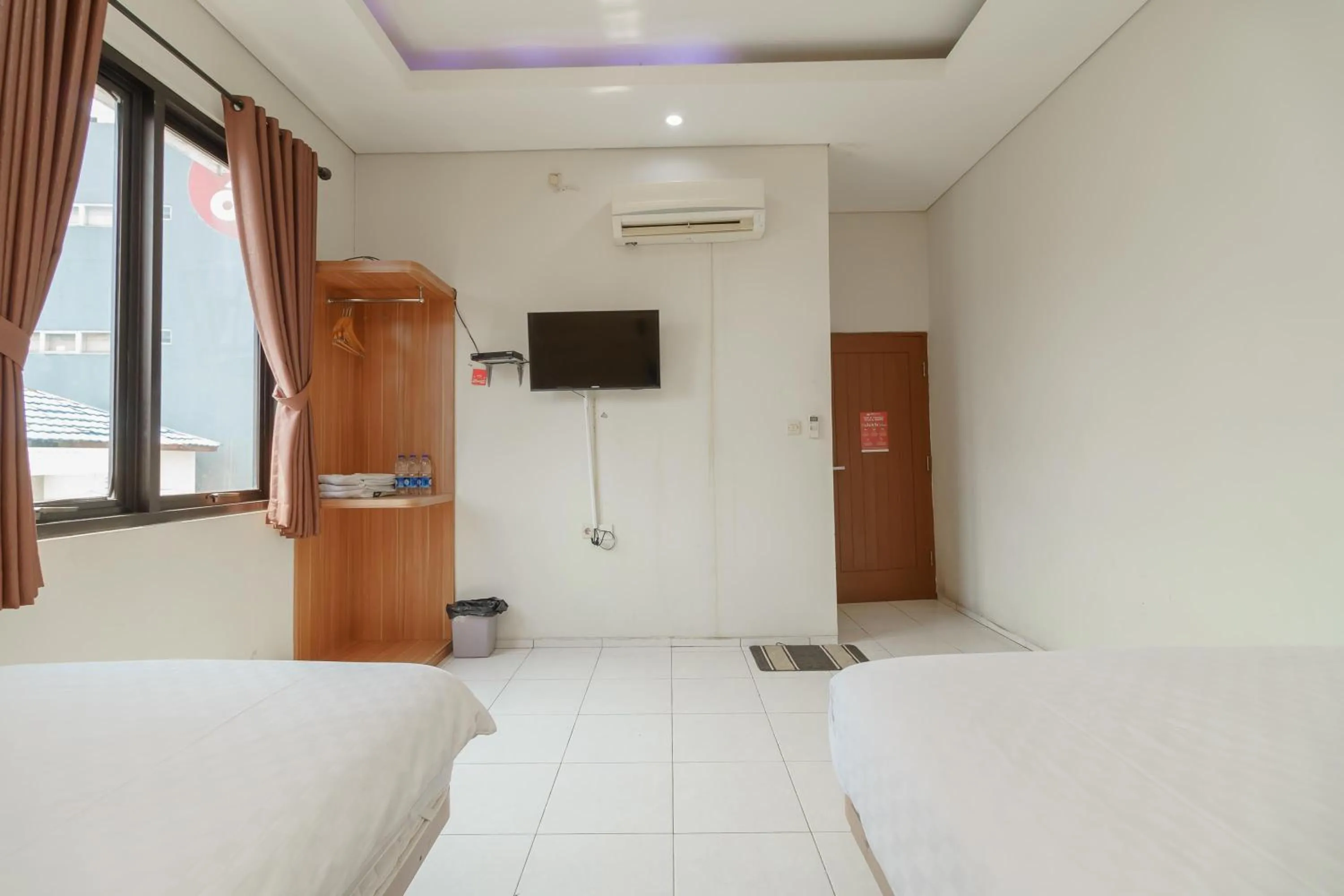 Bed in Green Apple Residence near Sarinah Mitra RedDoorz