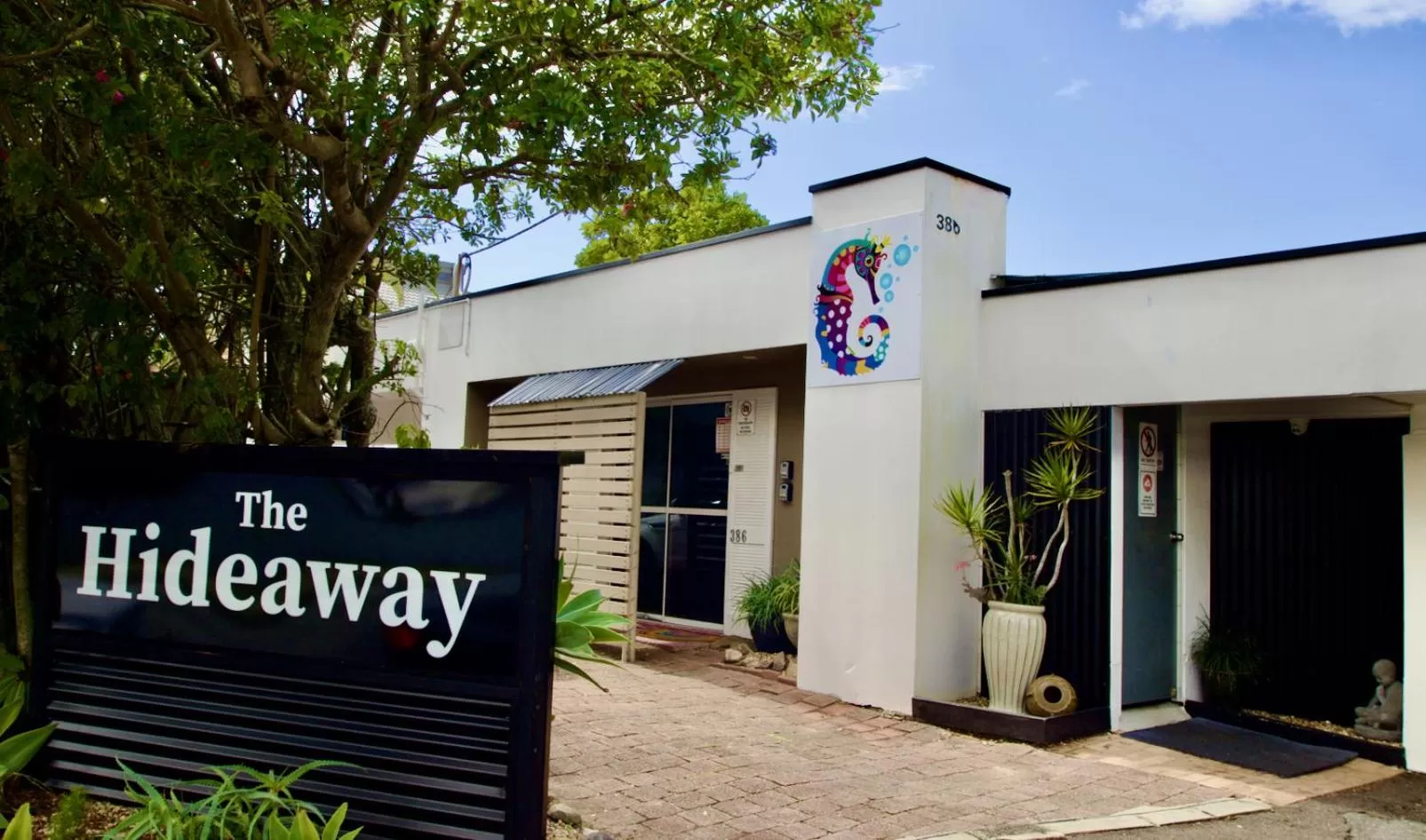 Property Logo/Sign in Hideaway Noosa Men Only Beach Resort