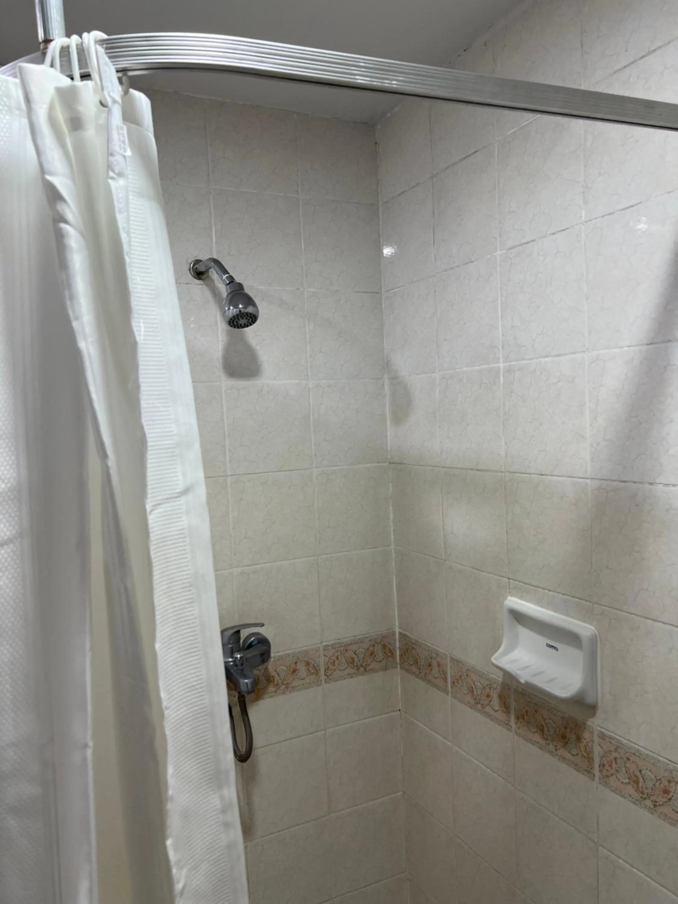 Shower in Mall Suites Hotel