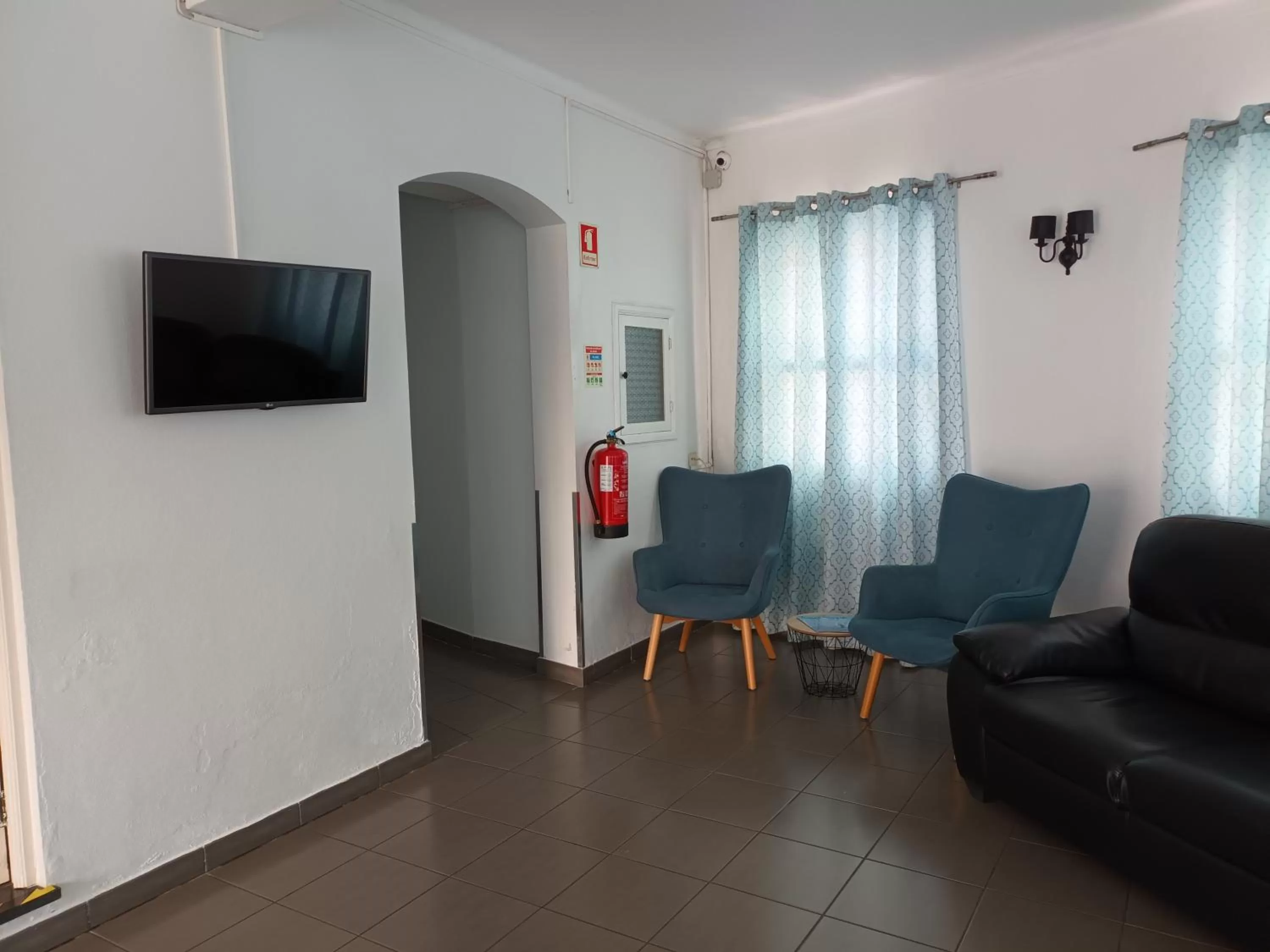 Communal lounge/ TV room in Hotel Branco I