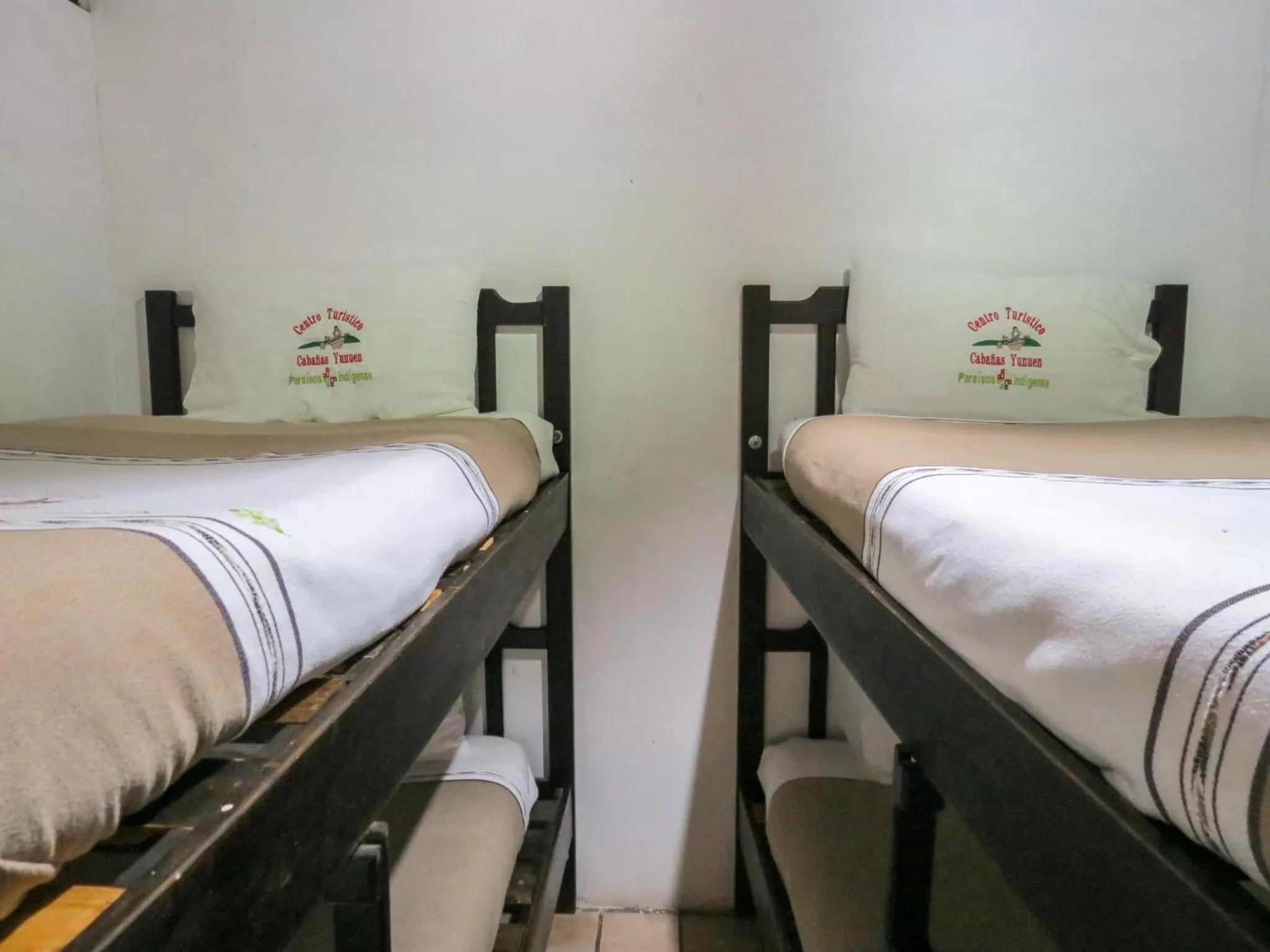 Bed in Cabañas Yunuén by Rotamundos