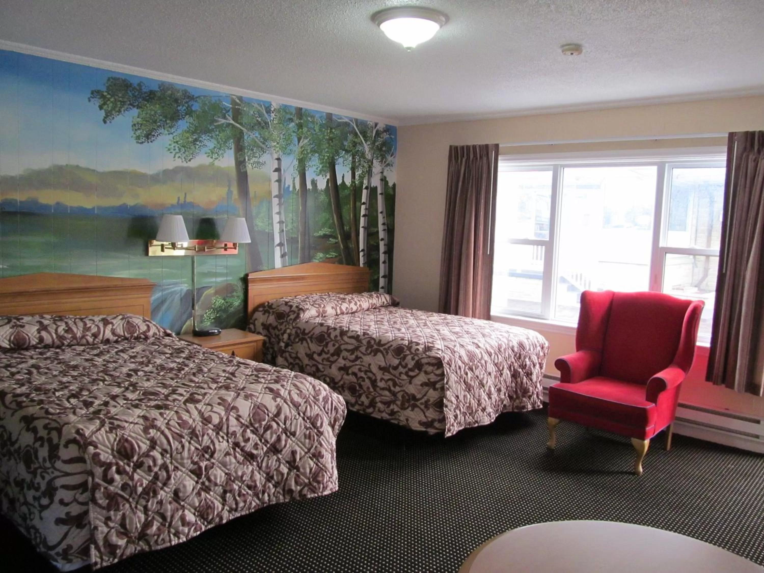 Photo of the whole room, Bed in Knights Inn London Ontario