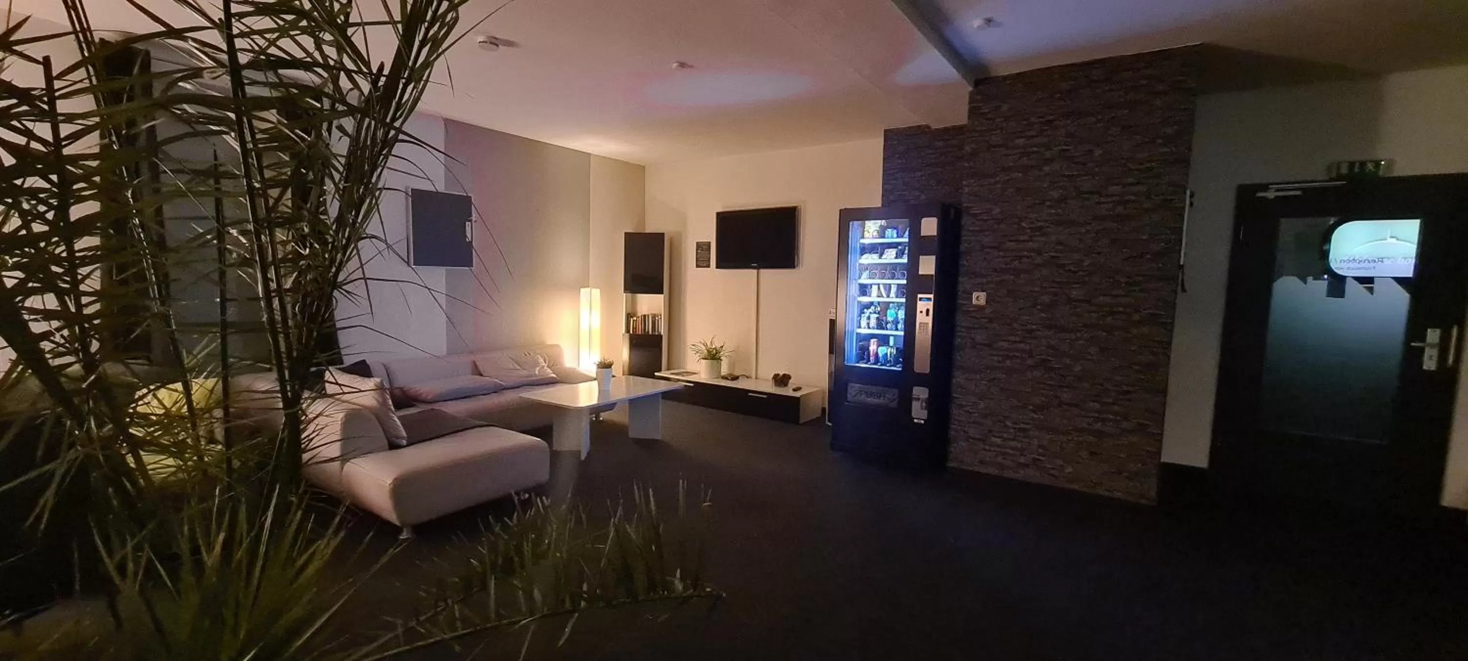 Communal lounge/ TV room, Seating Area in Harz Hostel