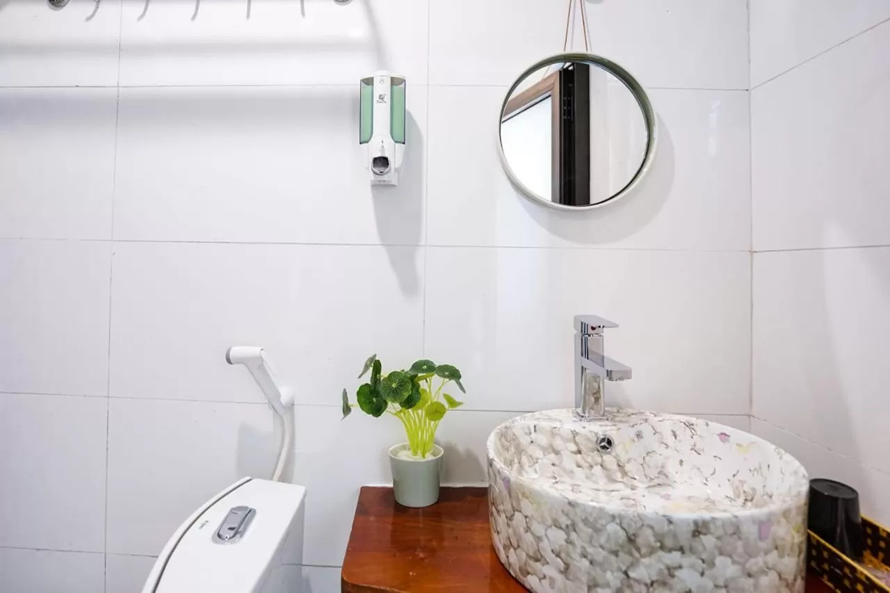 Bathroom in Almor Hostel With Pool in right center