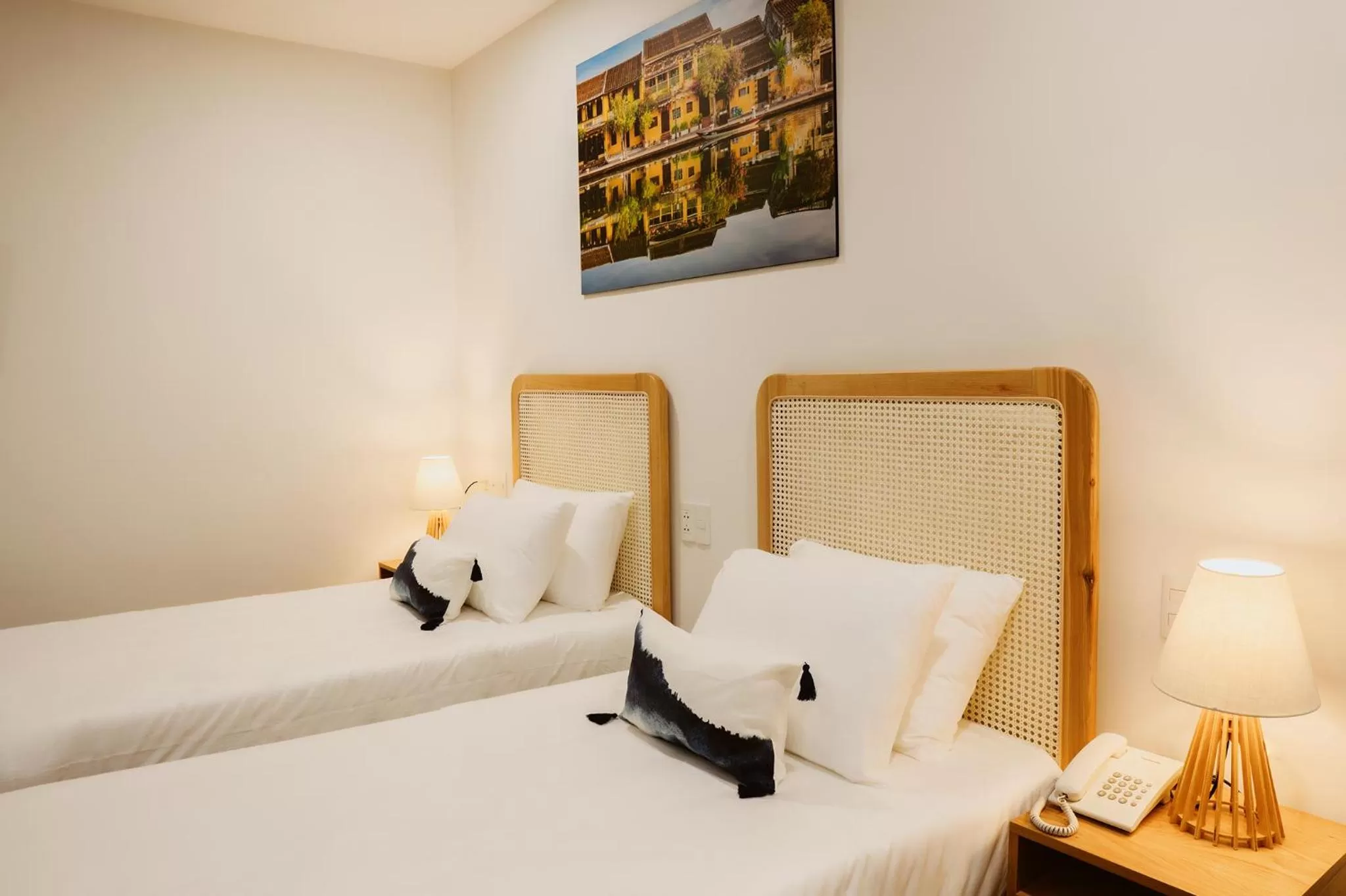 Bed in The Watermark Beachside Hotel