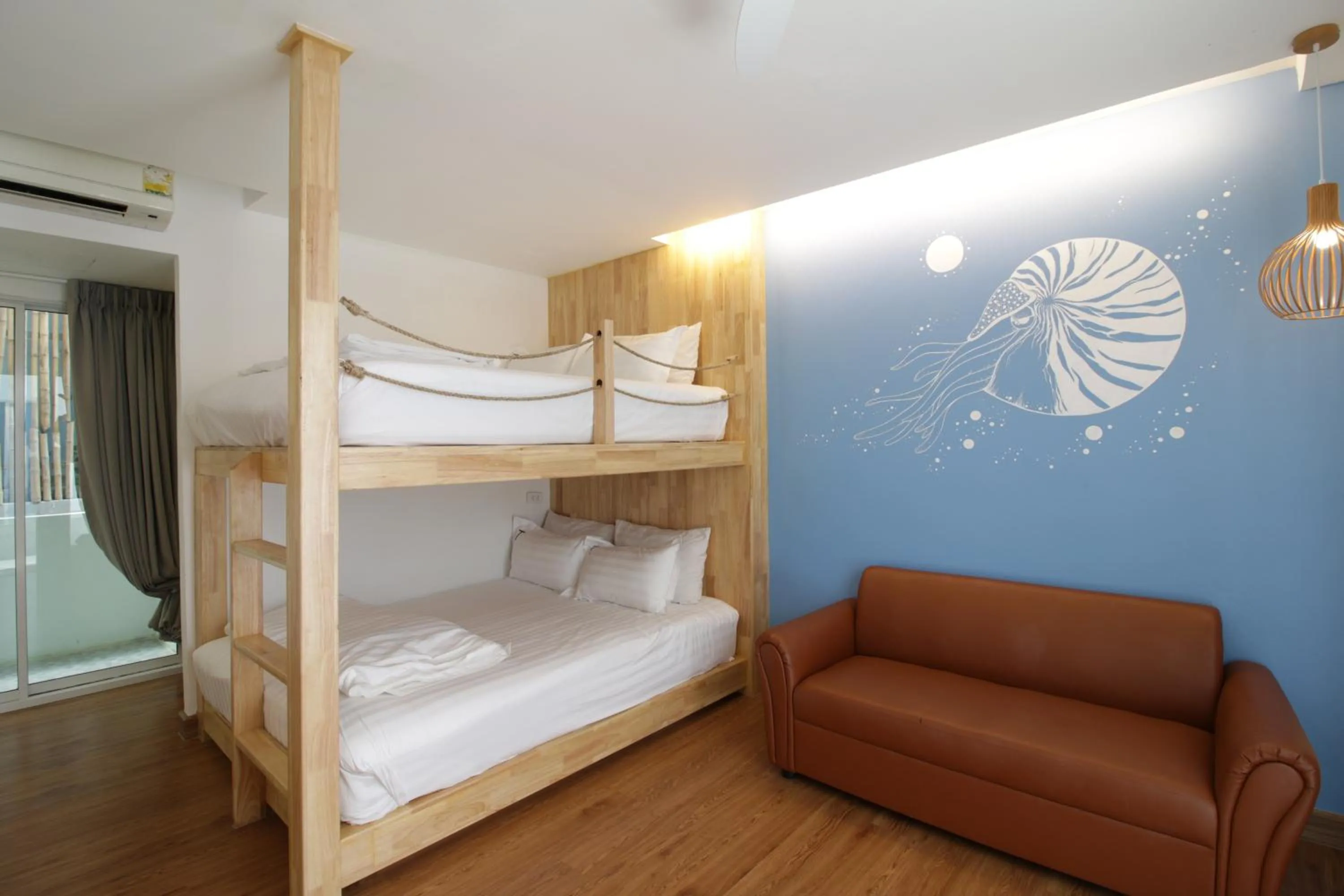 Bed in Tawaen Beach Resort