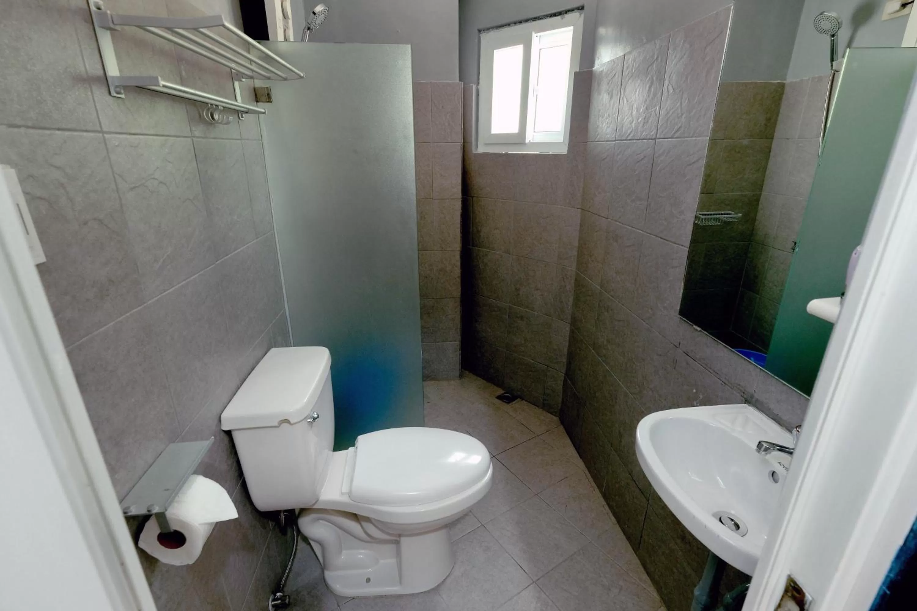 Bed, Bathroom in Pescadores Suites Moalboal